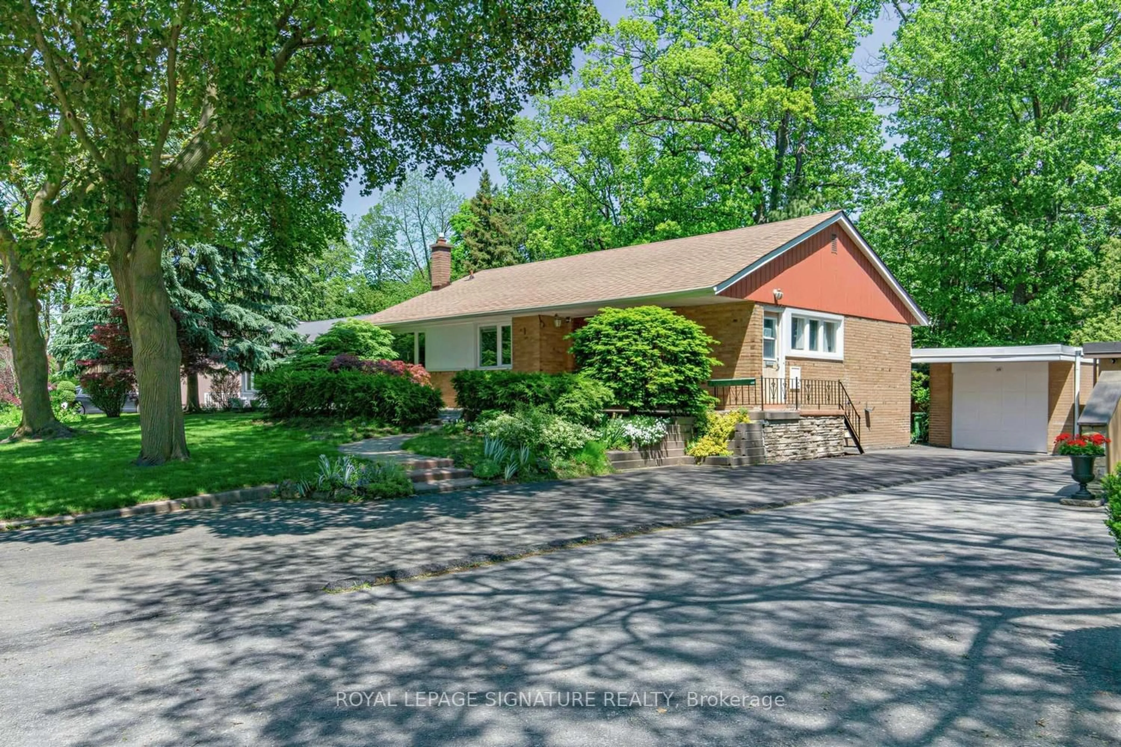Home with brick exterior material, street for 69 Greenland Rd, Toronto Ontario M3C 1N4