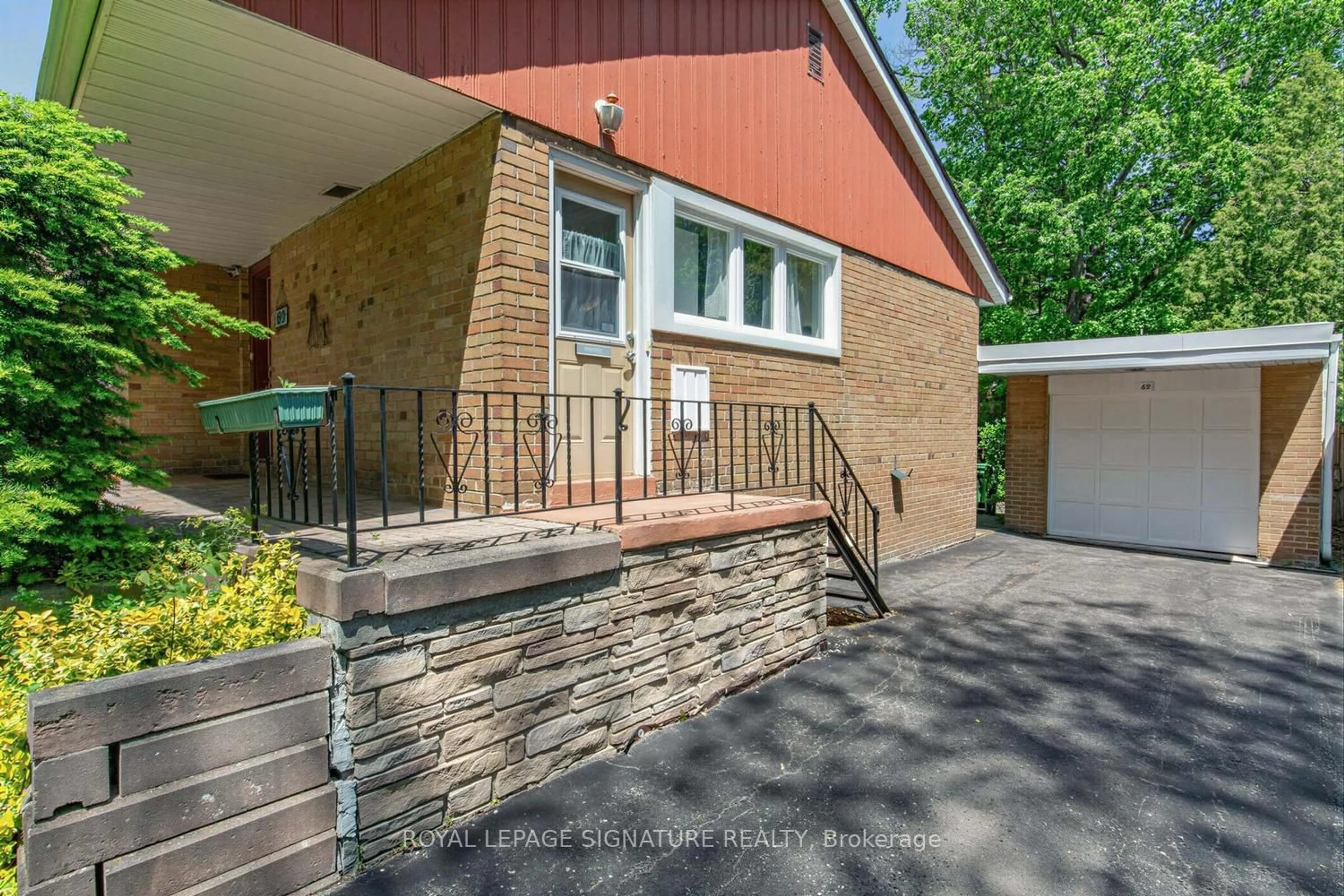 Home with brick exterior material, street for 69 Greenland Rd, Toronto Ontario M3C 1N4