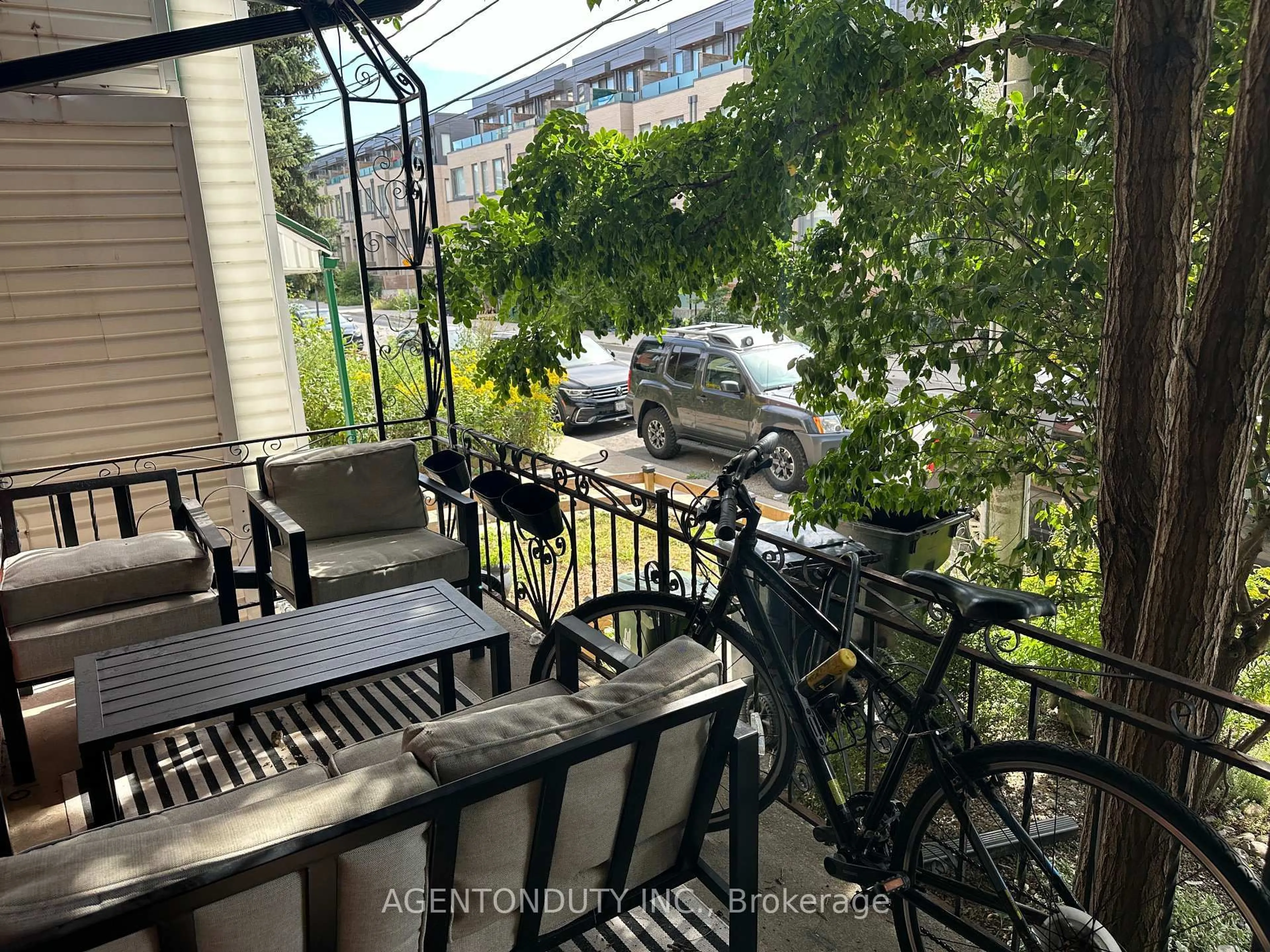 Balcony in the apartment, city buildings view from balcony for 51 Perth Ave, Toronto Ontario M6R 2C1