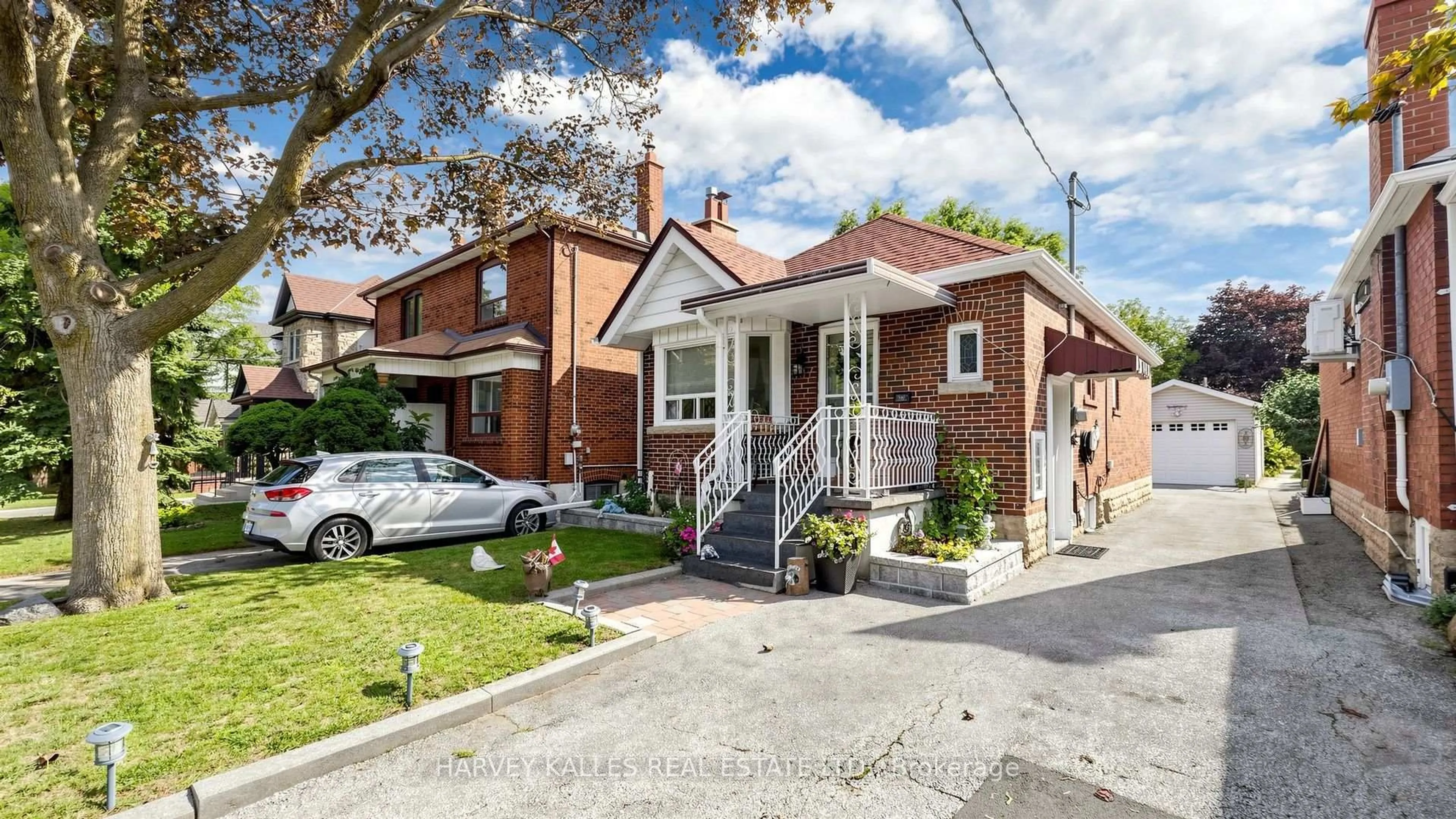 Home with brick exterior material, street for 507 Atlas Ave, Toronto Ontario M6C 3R4