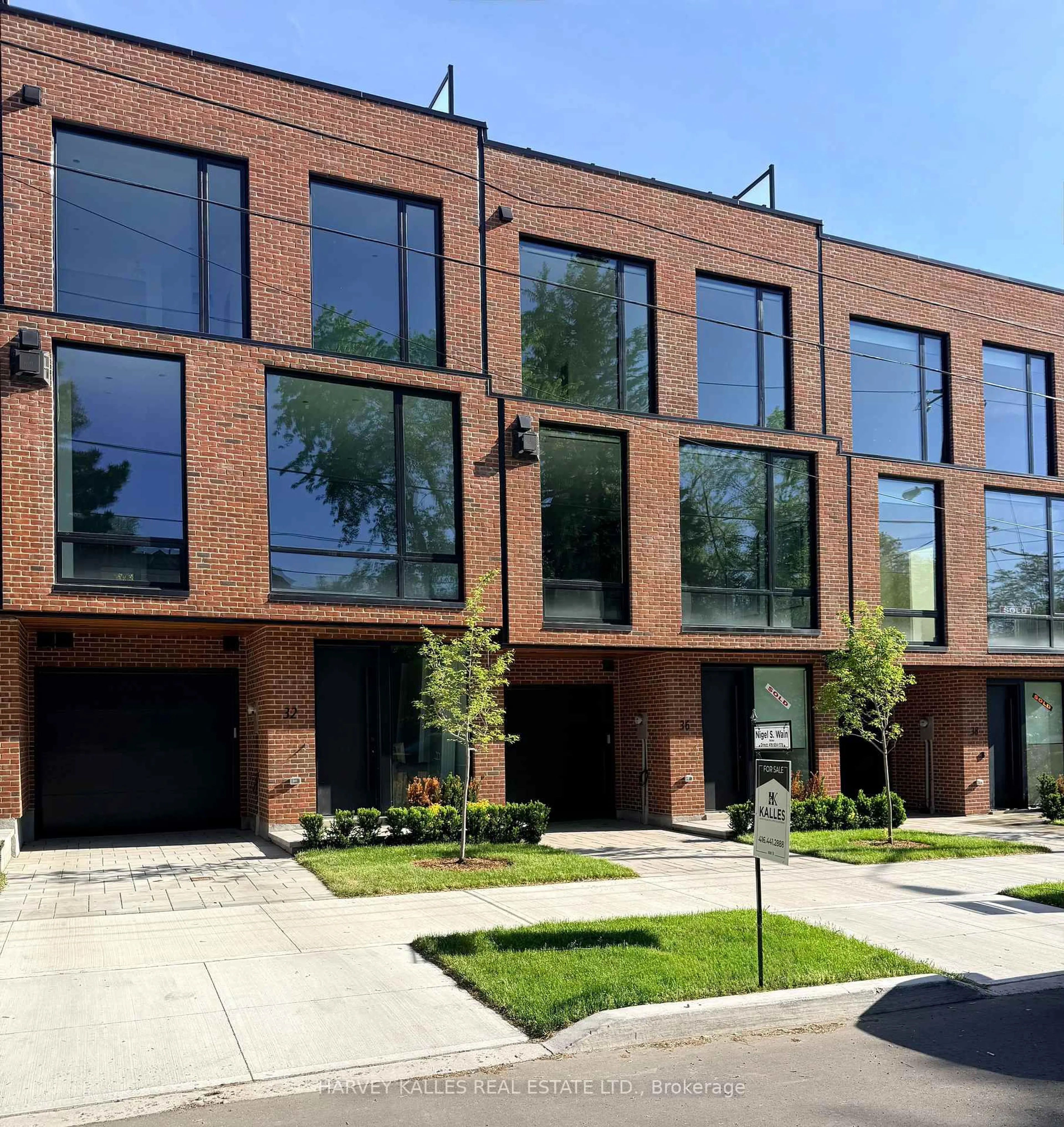 Home with brick exterior material, street for 32 Evergreen Gdns, Toronto Ontario M4G 1C5