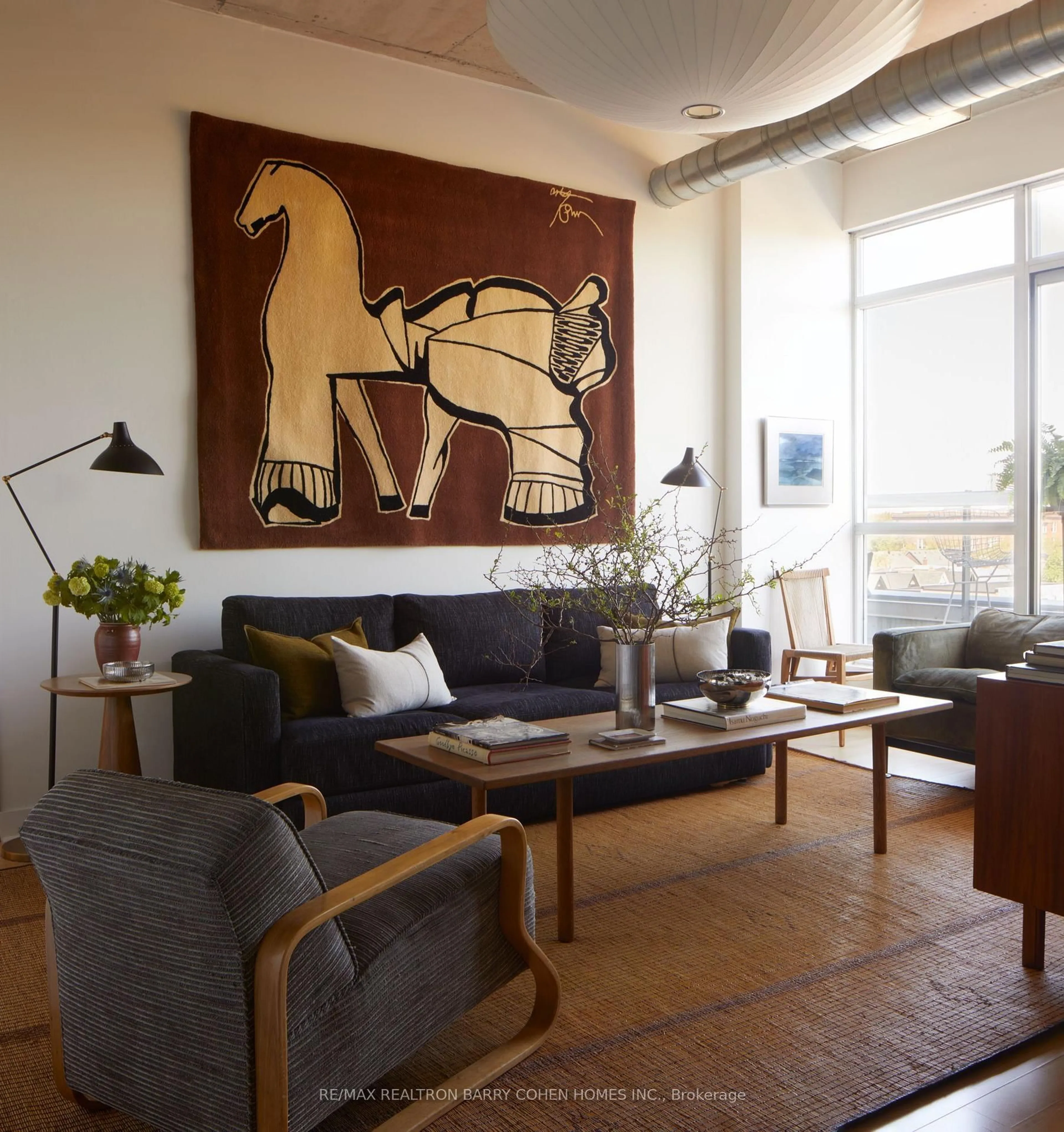 Living room with furniture, wood/laminate floor for 955 Queen St #PH12, Toronto Ontario M6J 1G9