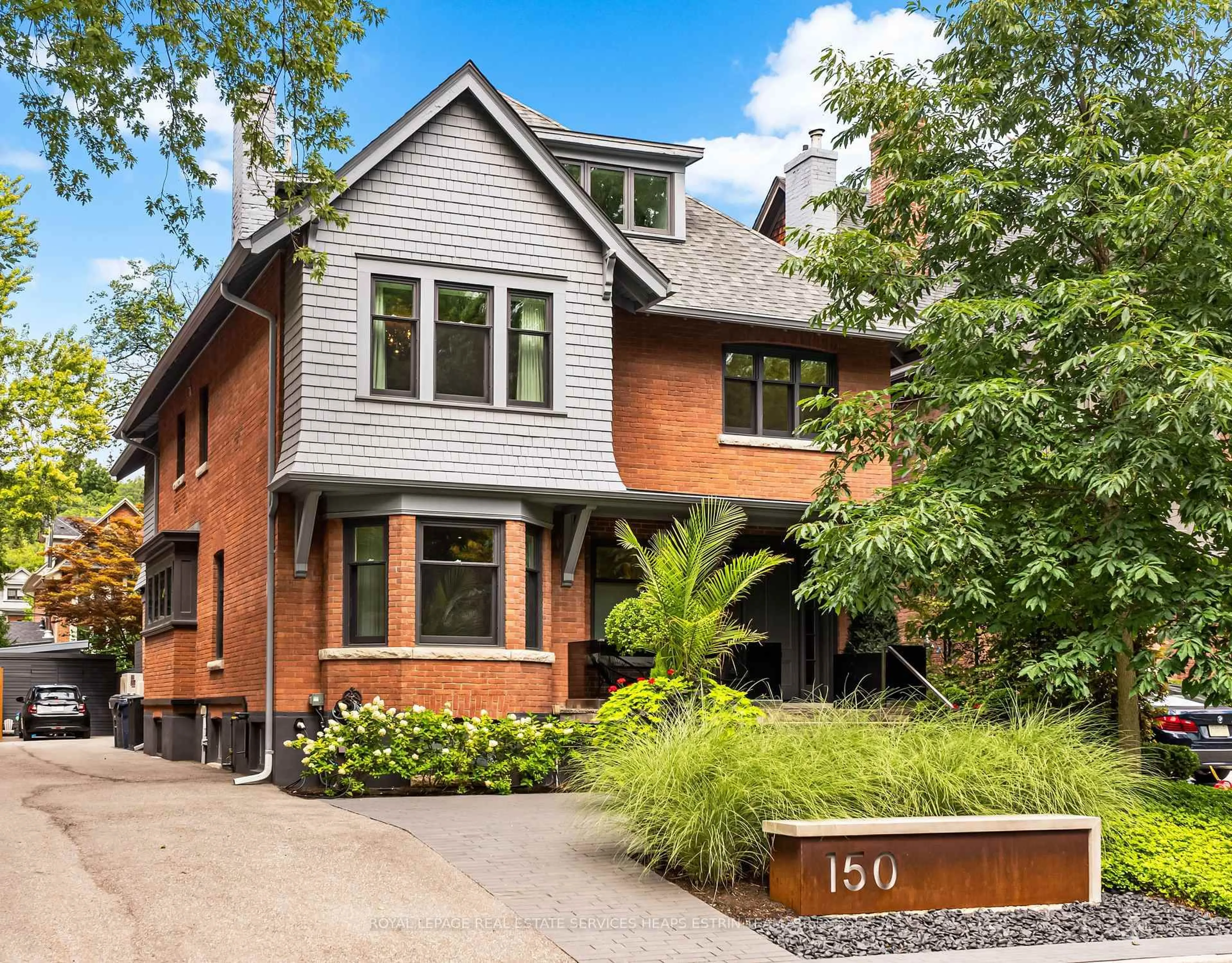 Home with brick exterior material, street for 150 Douglas Dr, Toronto Ontario M4W 2B7