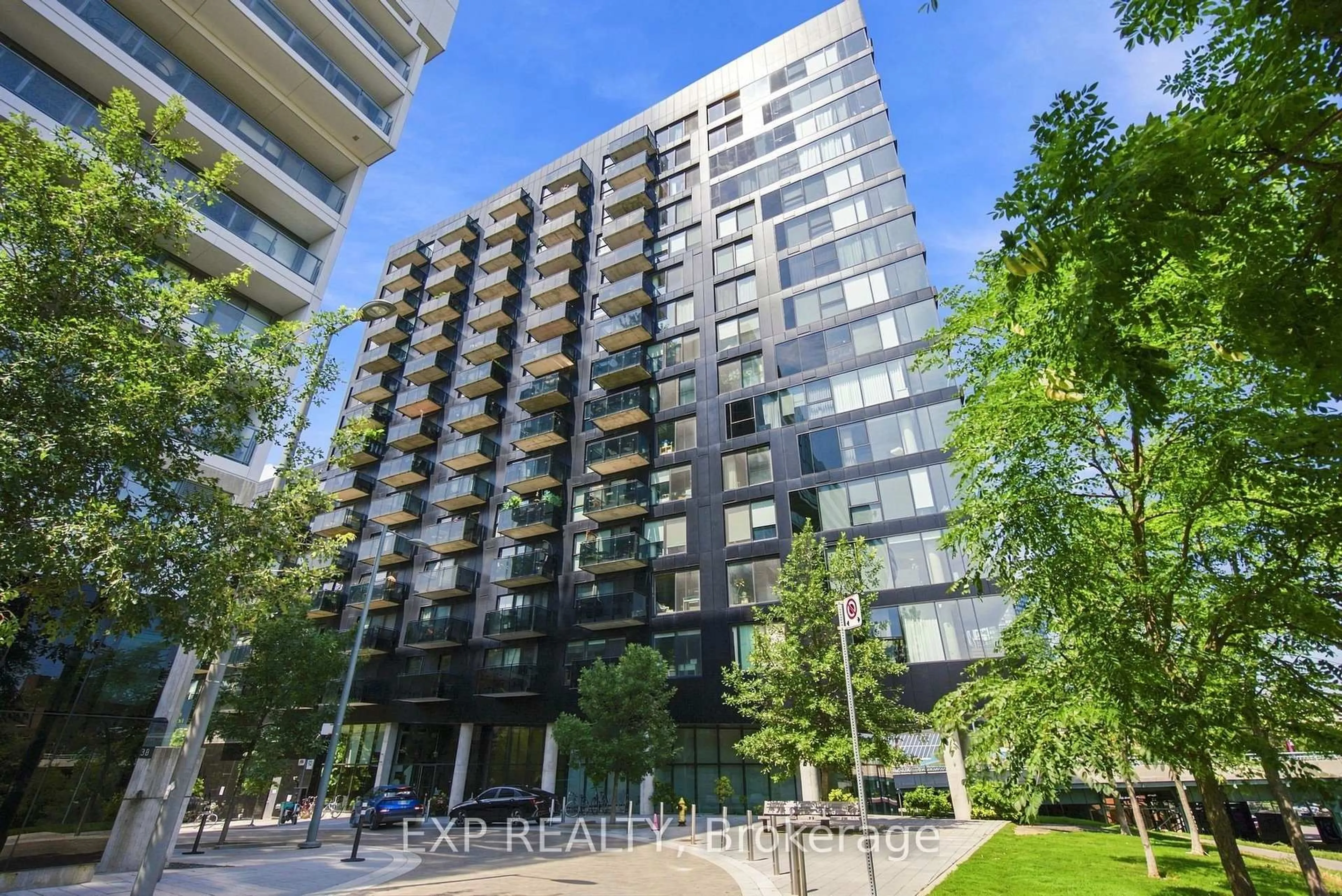 A pic from outside/outdoor area/front of a property/back of a property/a pic from drone, street for 51 Trolley Cres #604, Toronto Ontario M5A 0E9