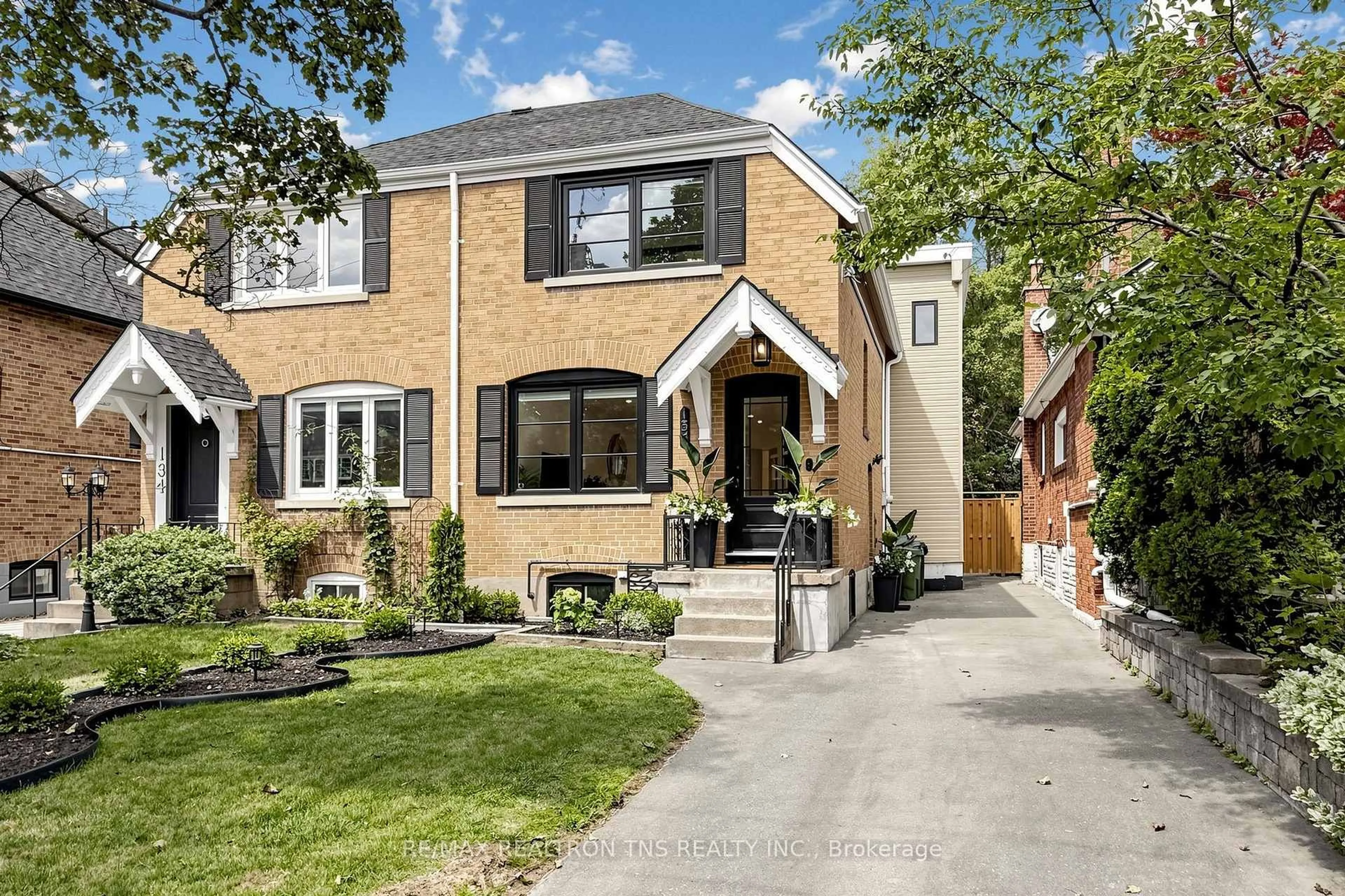 Home with brick exterior material, street for 136 Glenvale Blvd, Toronto Ontario M4G 2V9