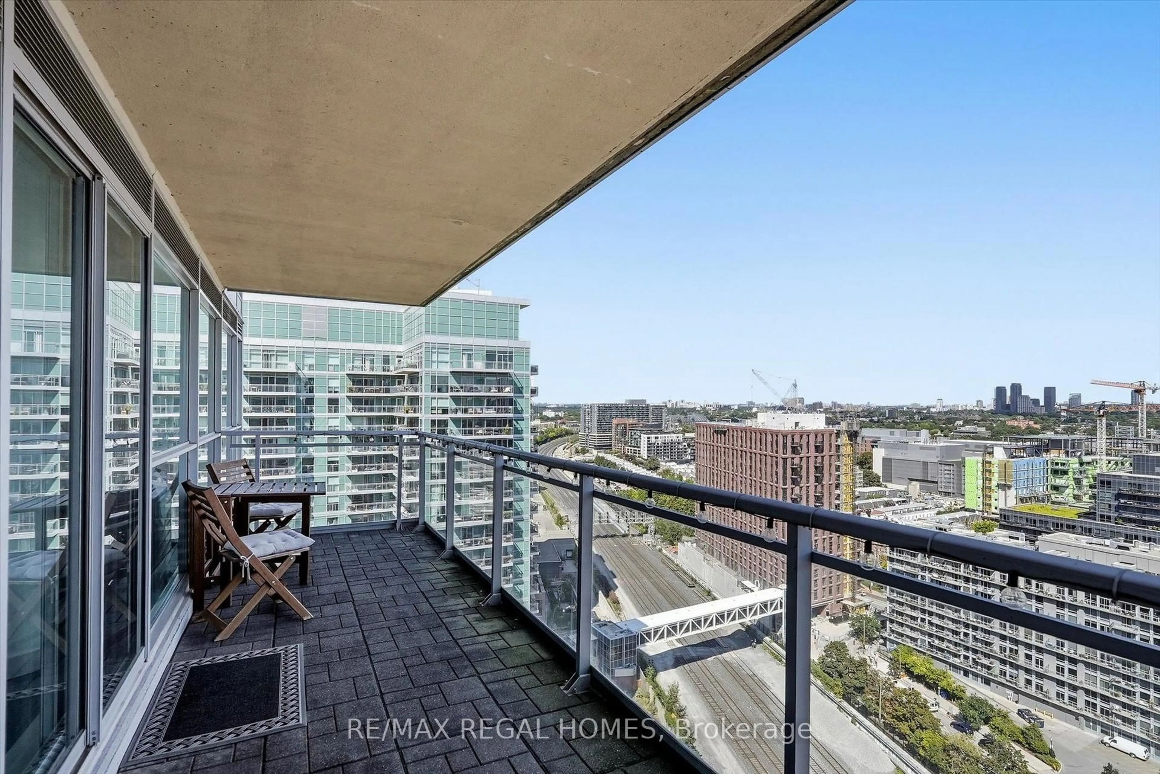 Balcony in the apartment, city buildings view from balcony for 80 Western Battery Rd #2304, Toronto Ontario M6K 3S1