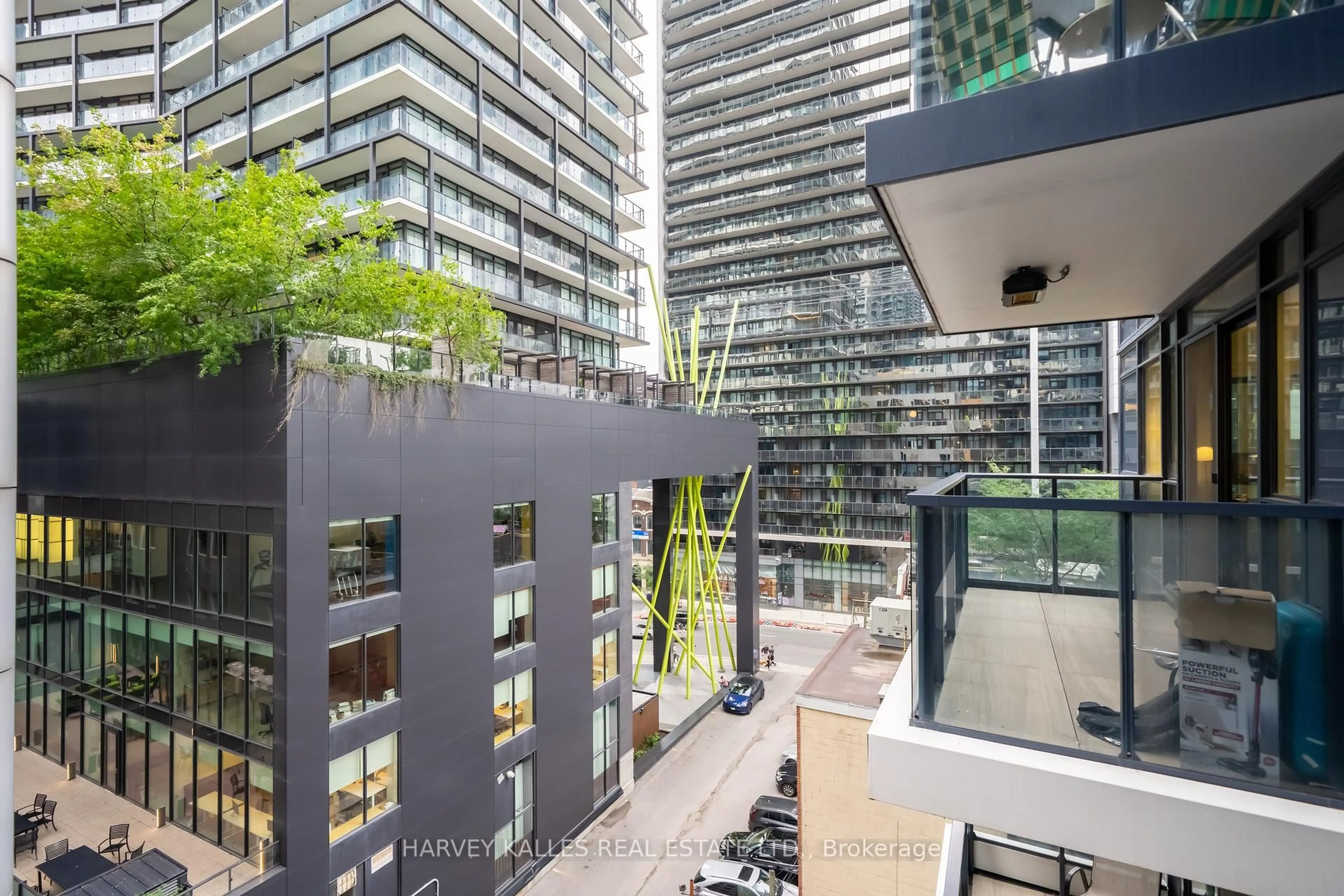 Patio, city buildings view from balcony for 38 Widmer St #710, Toronto Ontario M5V 2E9
