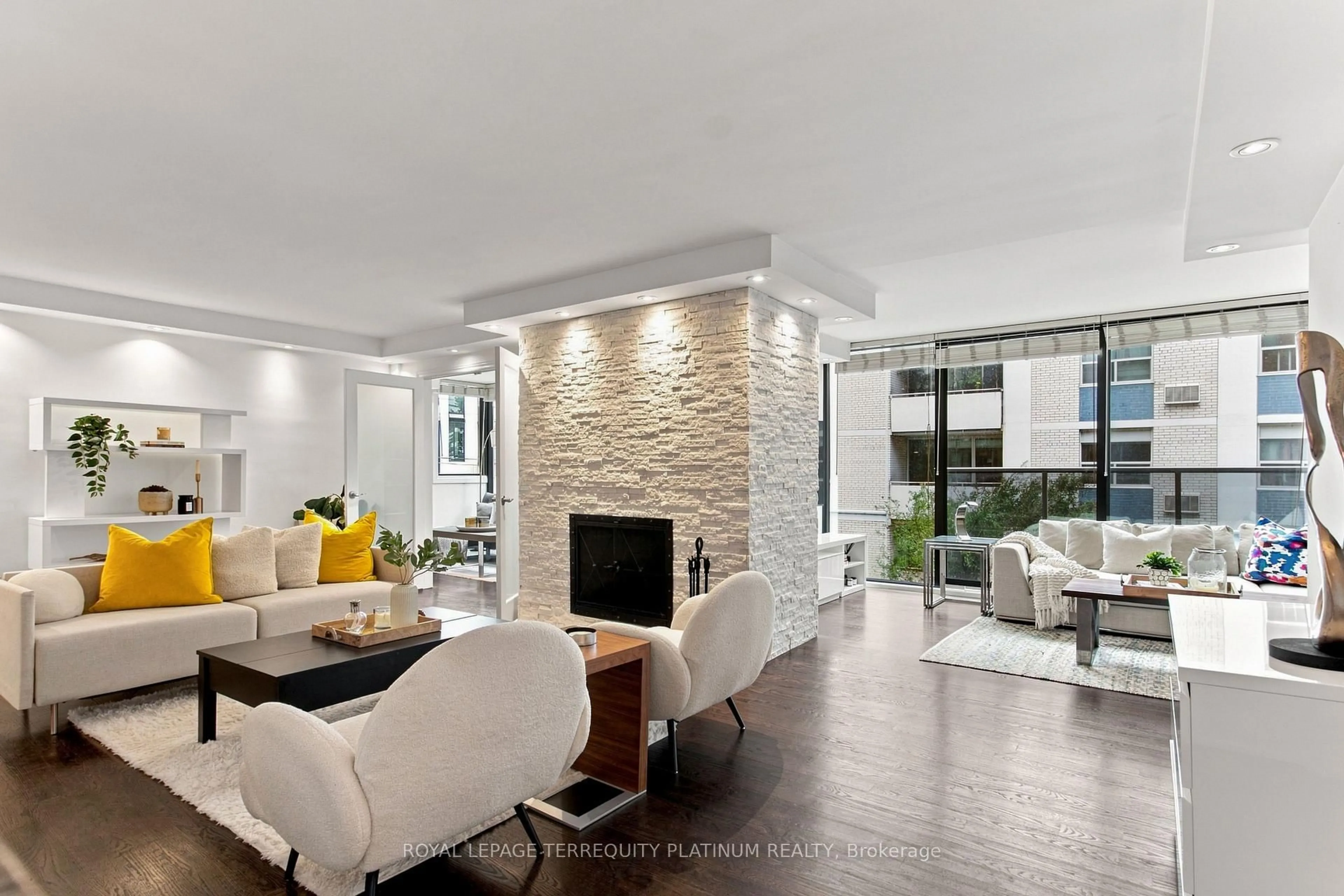 Living room with furniture, ceramic/tile floor for 70 Montclair Ave #203, Toronto Ontario M5P 1P7