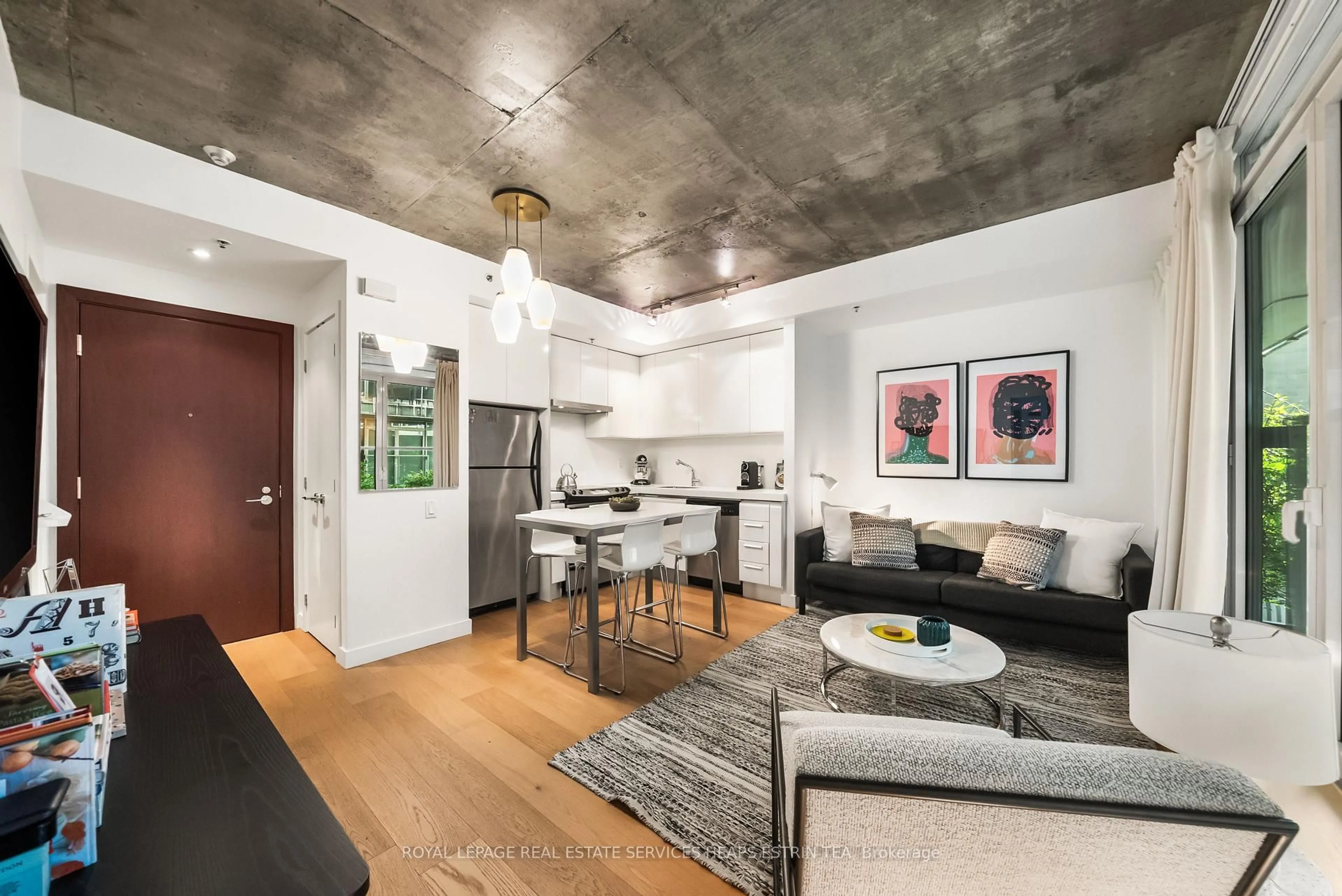 Open concept kitchen, cement floor for 75 Portland St #205, Toronto Ontario M5V 2M9