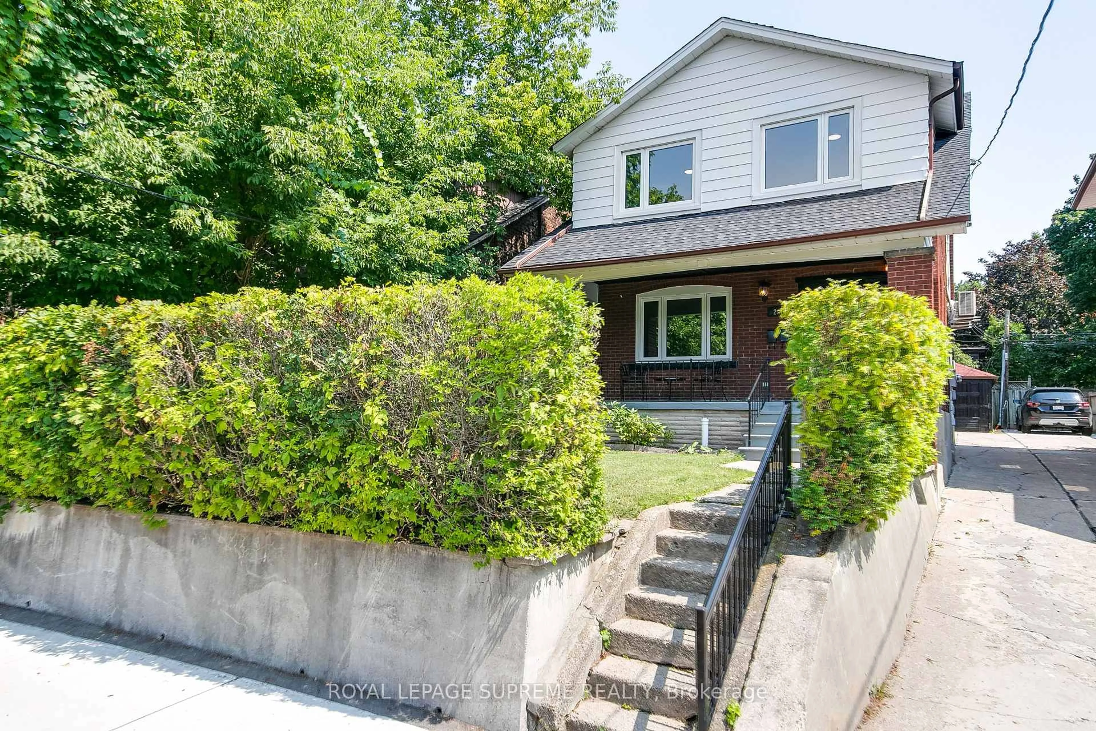 Home with brick exterior material, street for 229 Winona Dr, Toronto Ontario M6C 3S4