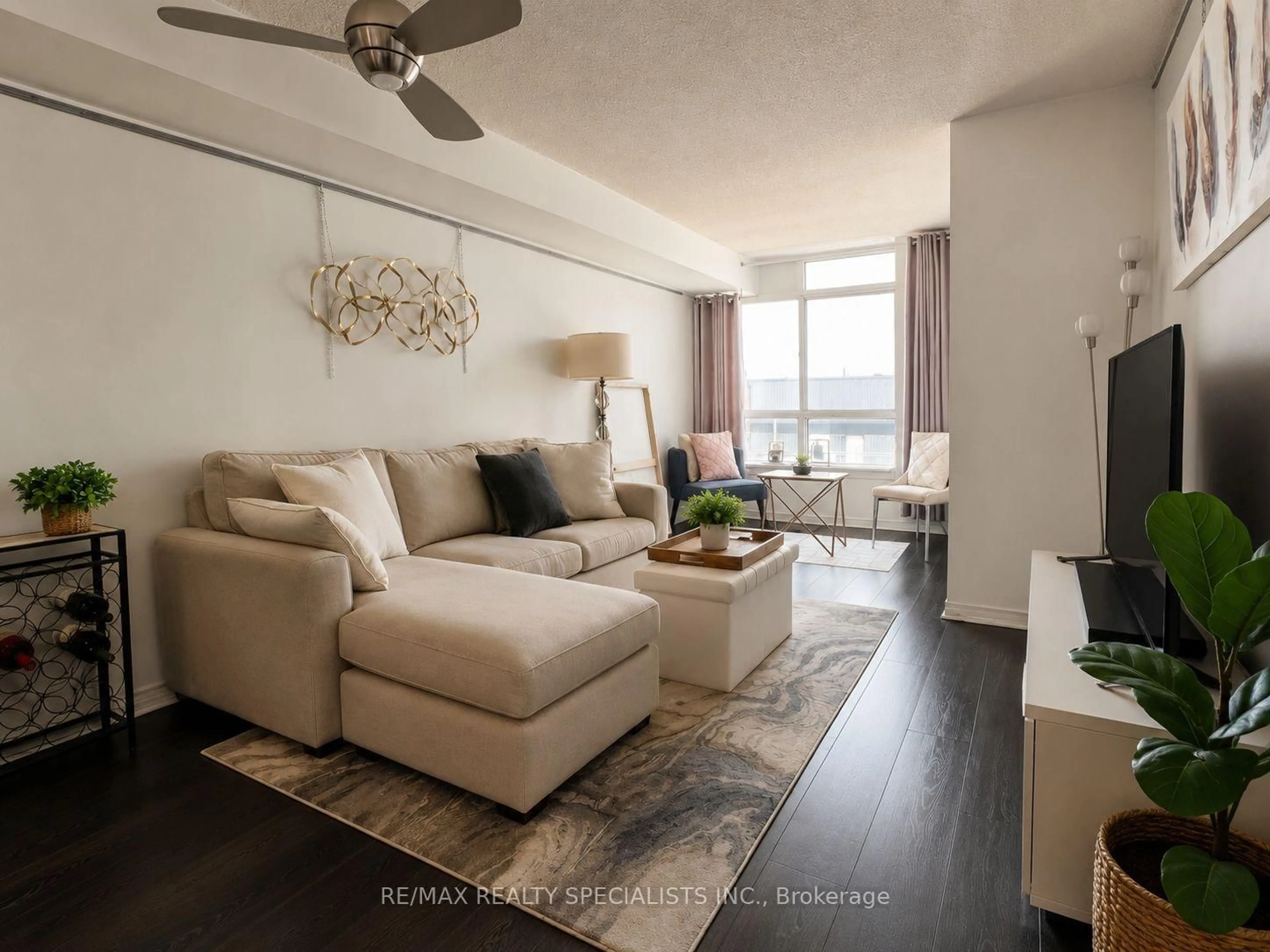 Living room with furniture, wood/laminate floor for 801 King St #1120, Toronto Ontario M5V 3C9