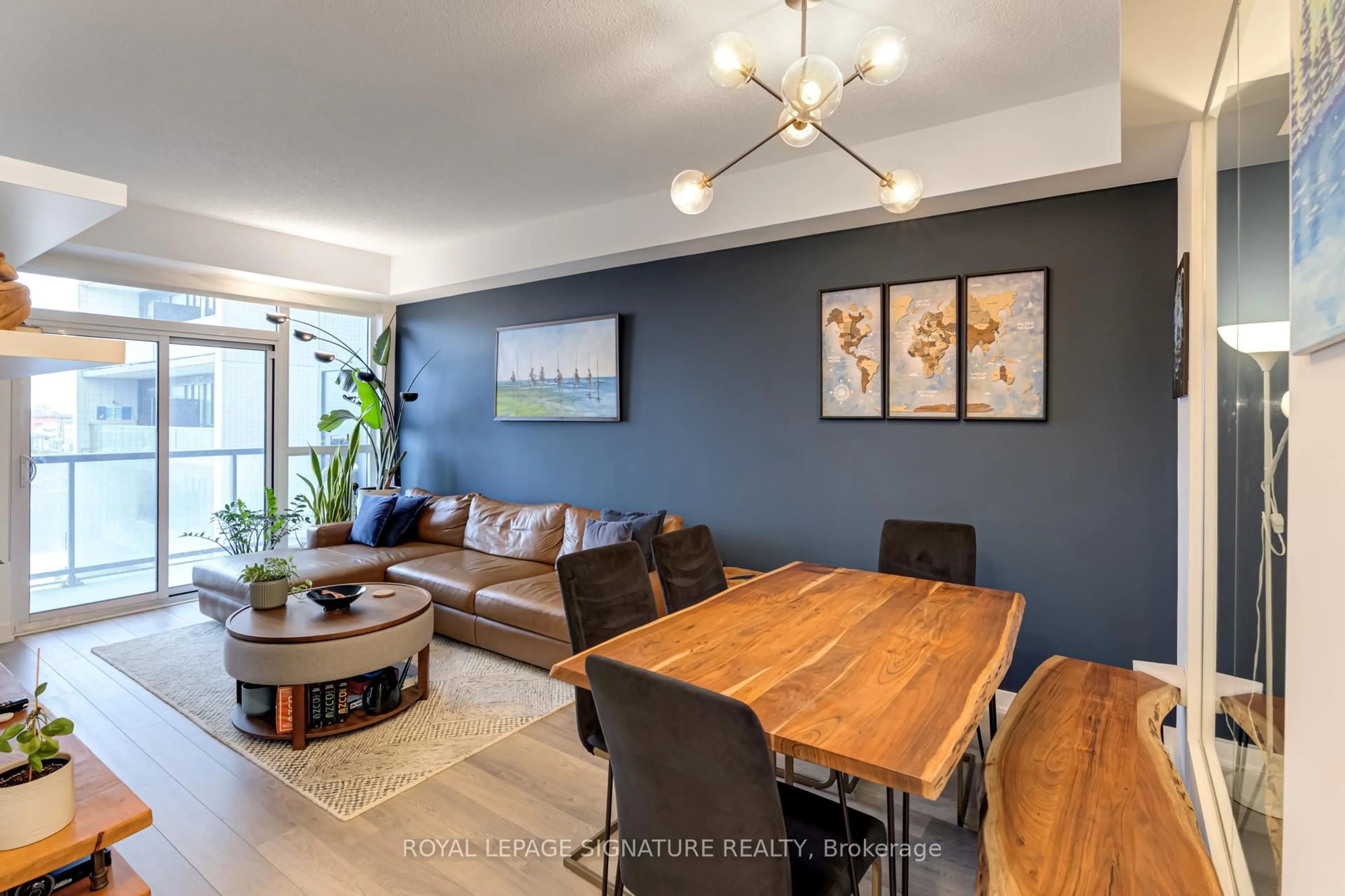 Living room with furniture, wood/laminate floor for 1603 Eglinton Ave #507, Toronto Ontario M6E 0A1