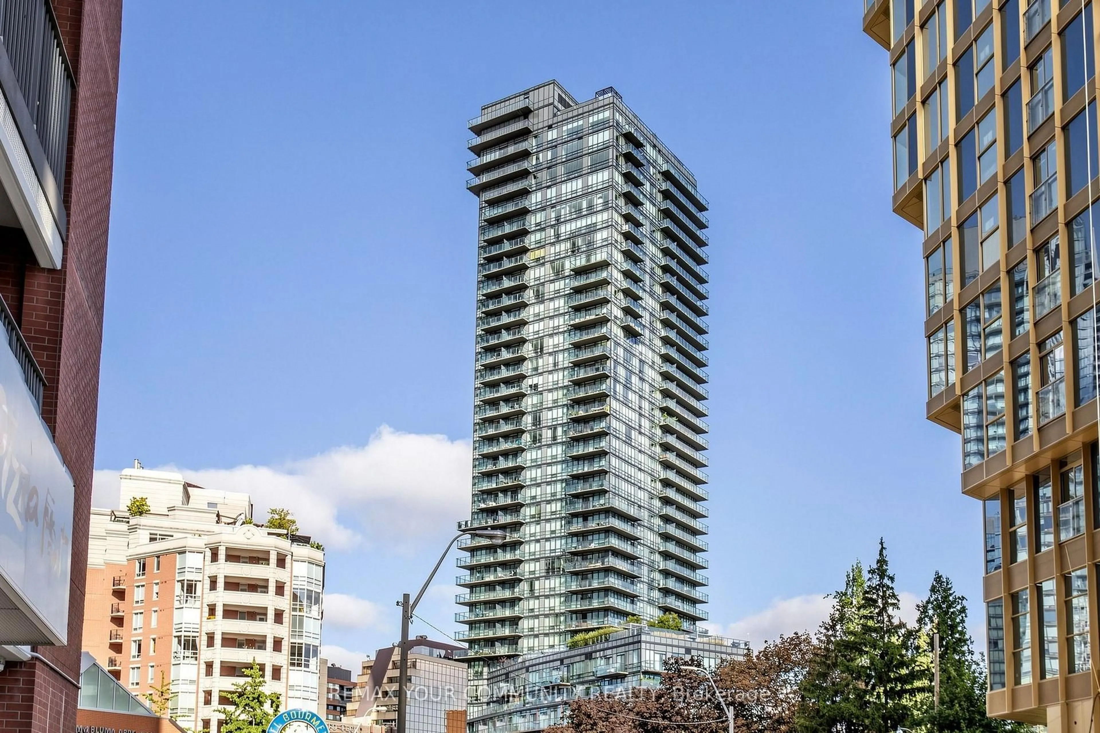 Balcony in the apartment, city buildings view from balcony for 825 Church St #2101, Toronto Ontario M4W 3Z4