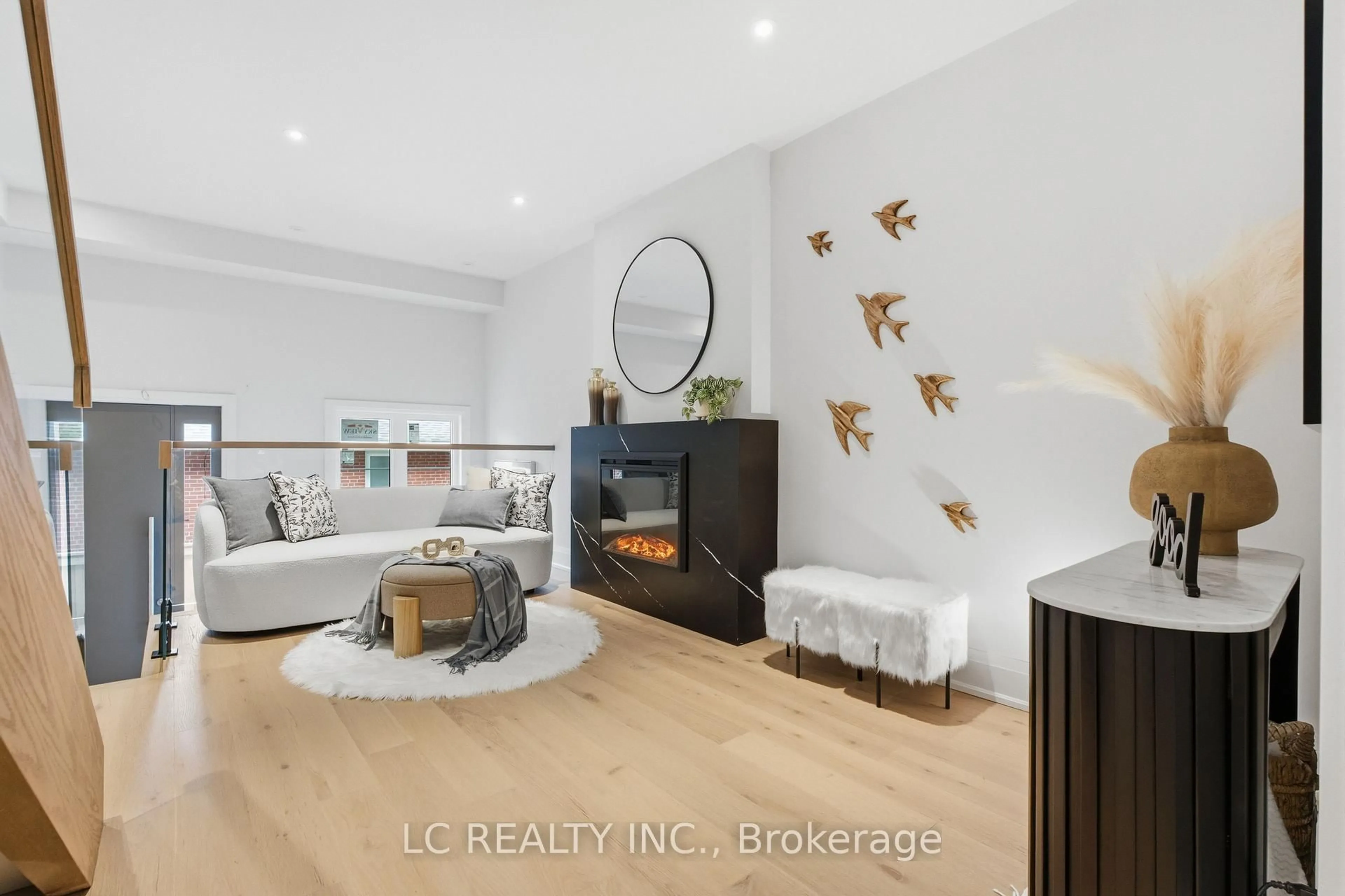 Living room with furniture, wood/laminate floor for 241 Finch Ave #A03, Toronto Ontario M2N 4S1