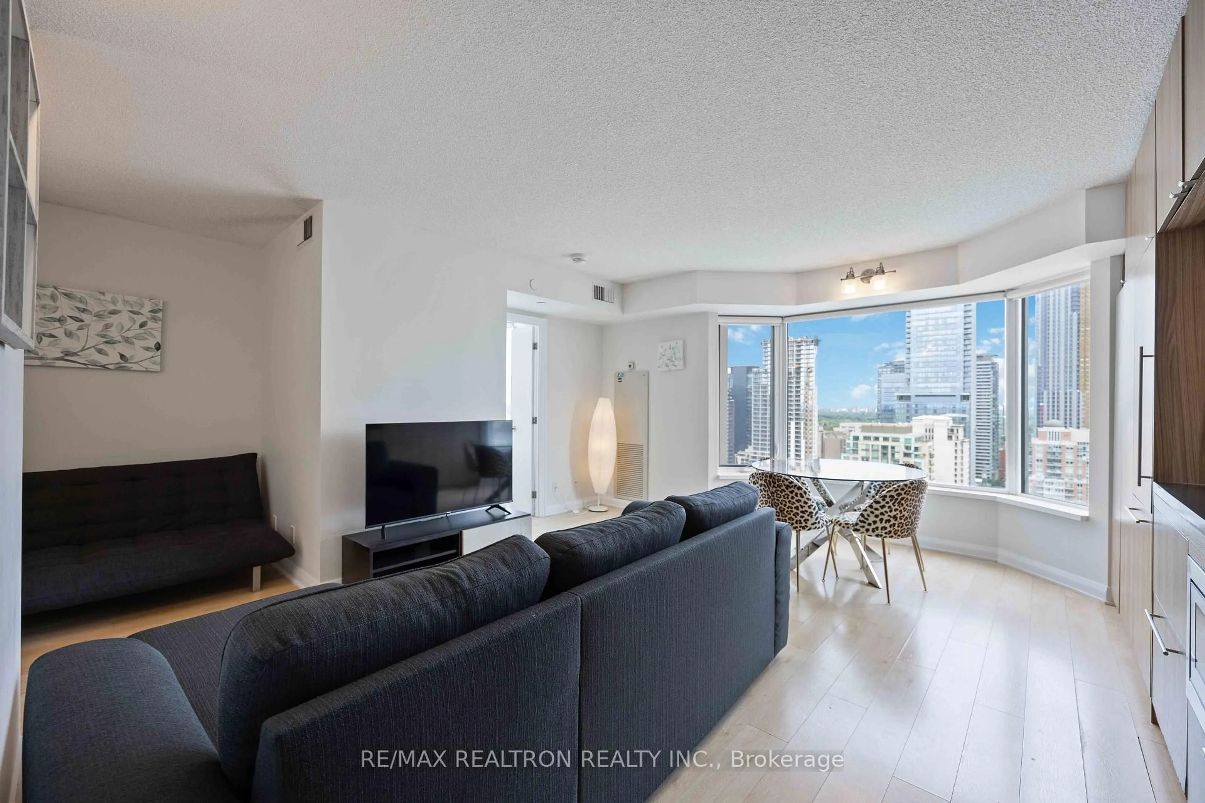 Living room with furniture, unknown for 155 Yorkville Ave #2604, Toronto Ontario M5R 0B4