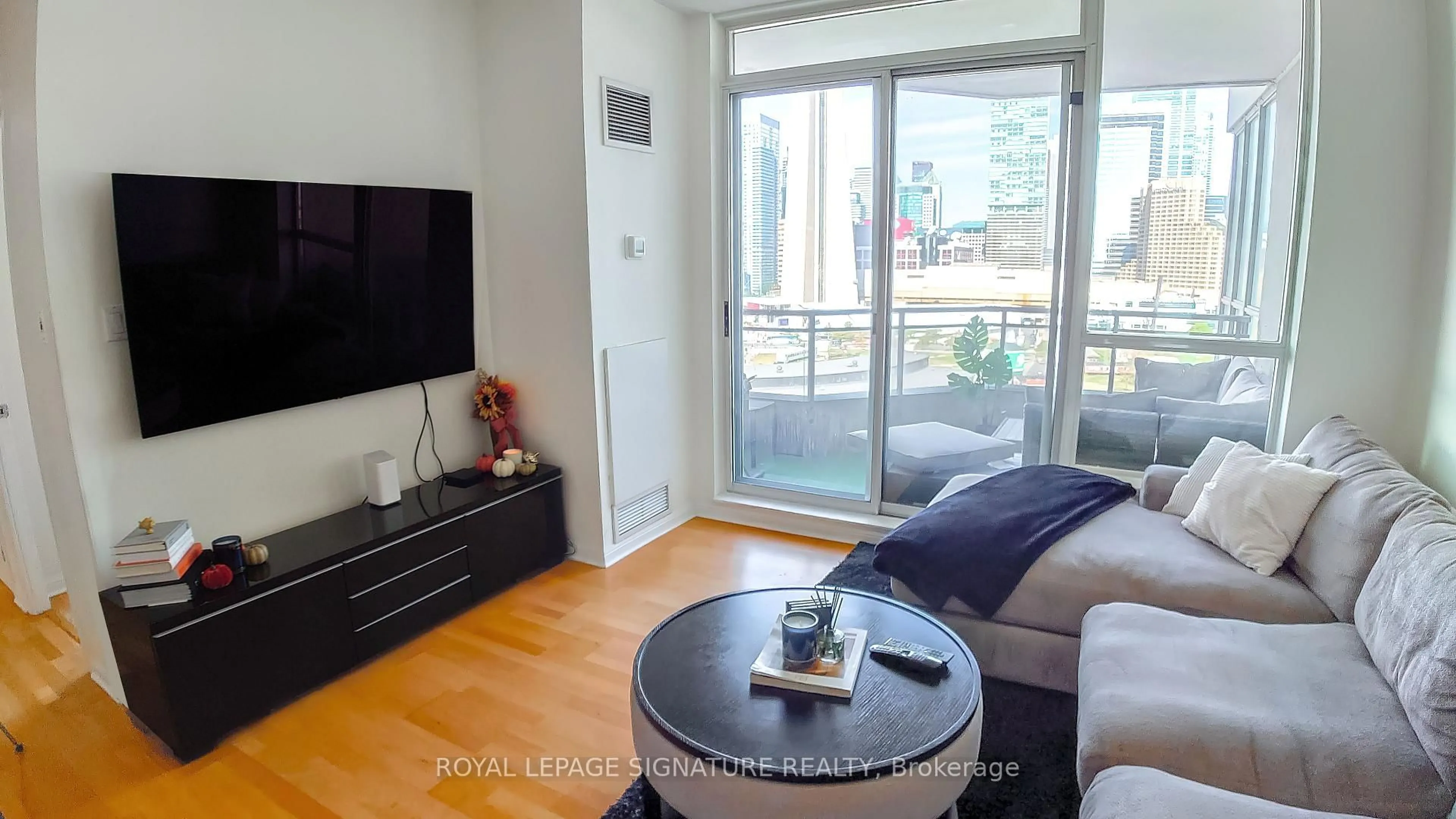 Living room with furniture, wood/laminate floor for 230 Queens Quay #1726, Toronto Ontario M5J 2Y7