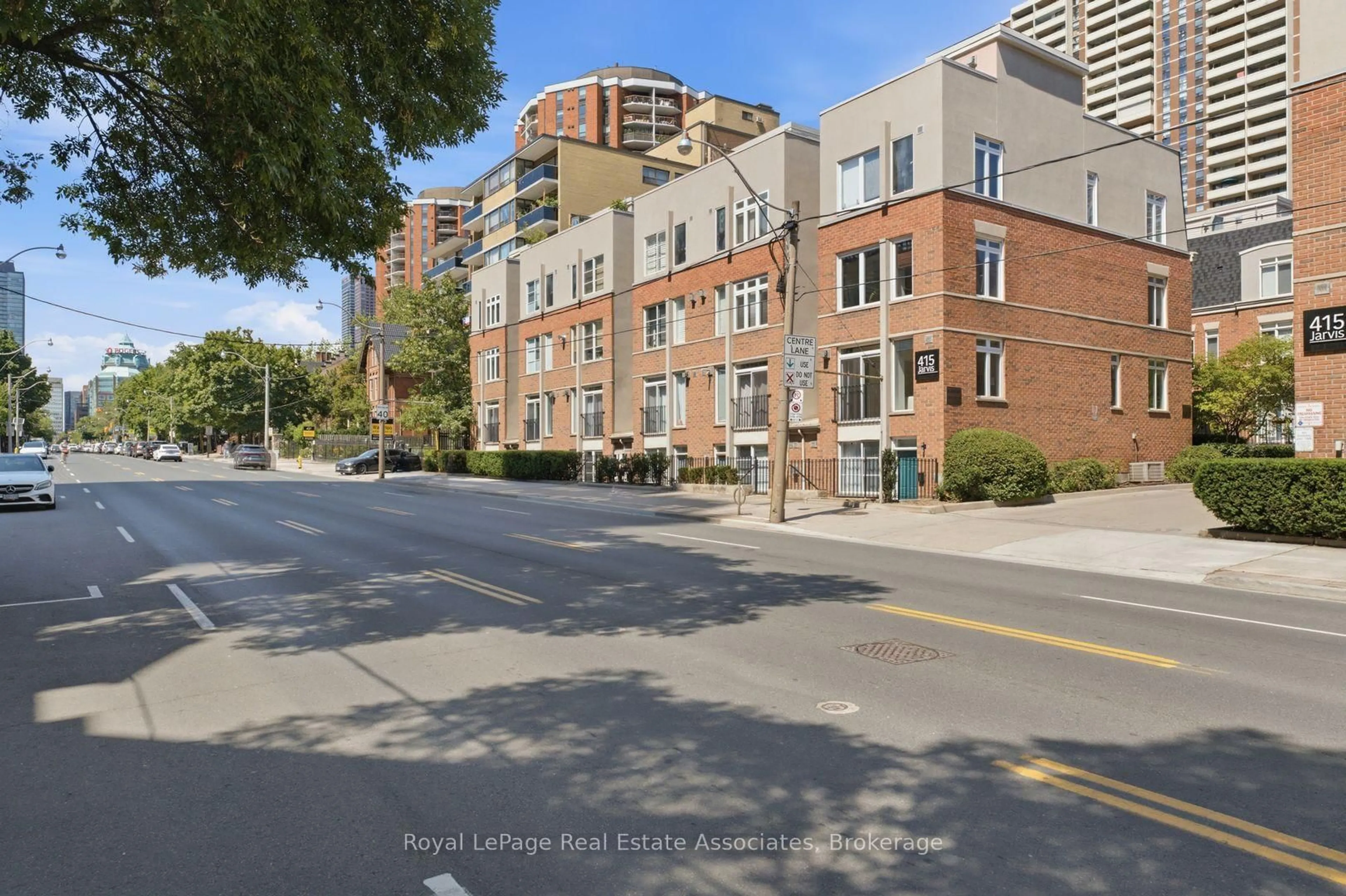 A pic from outside/outdoor area/front of a property/back of a property/a pic from drone, street for 415 Jarvis St #206, Toronto Ontario M4Y 3C1