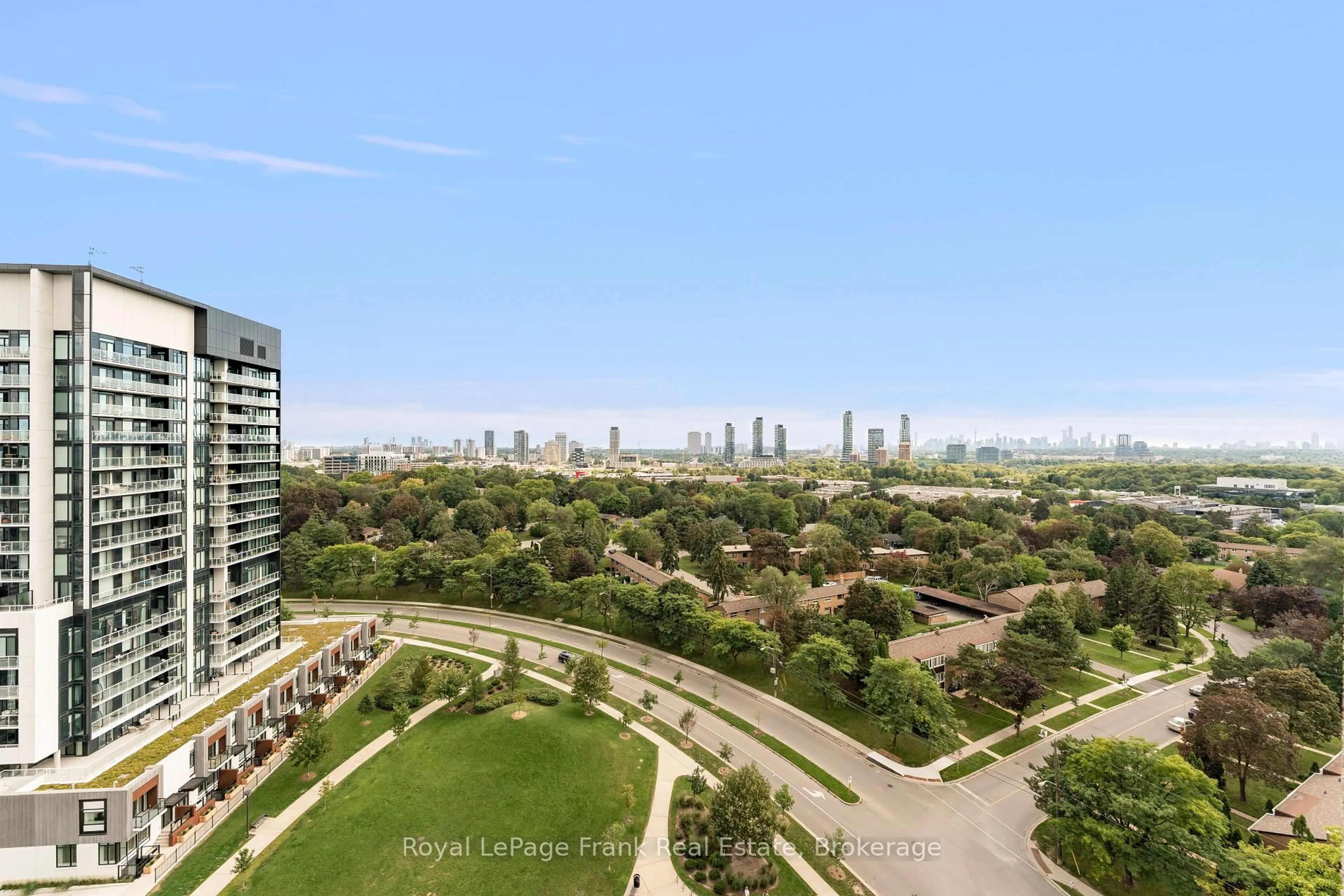 A pic from outside/outdoor area/front of a property/back of a property/a pic from drone, city buildings view from balcony for 75 The Donway #1306, Toronto Ontario M3C 2E9