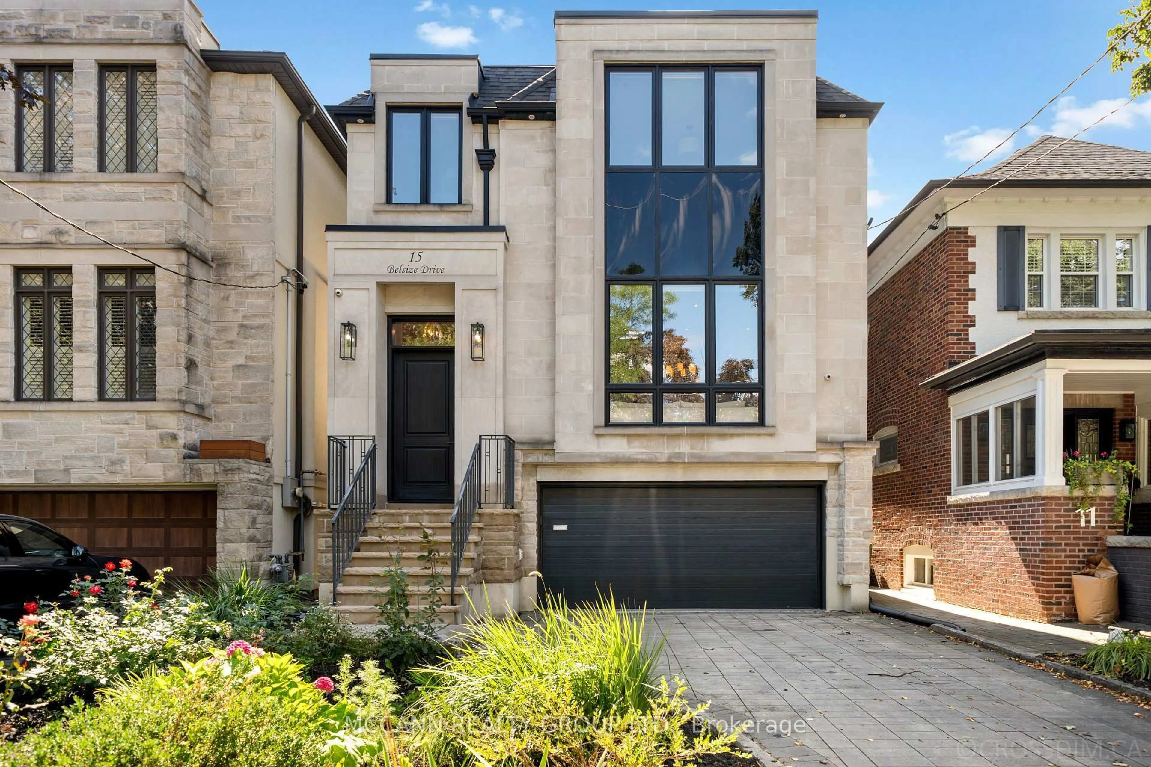 Home with brick exterior material, street for 15 Belsize Dr, Toronto Ontario M4S 1L3