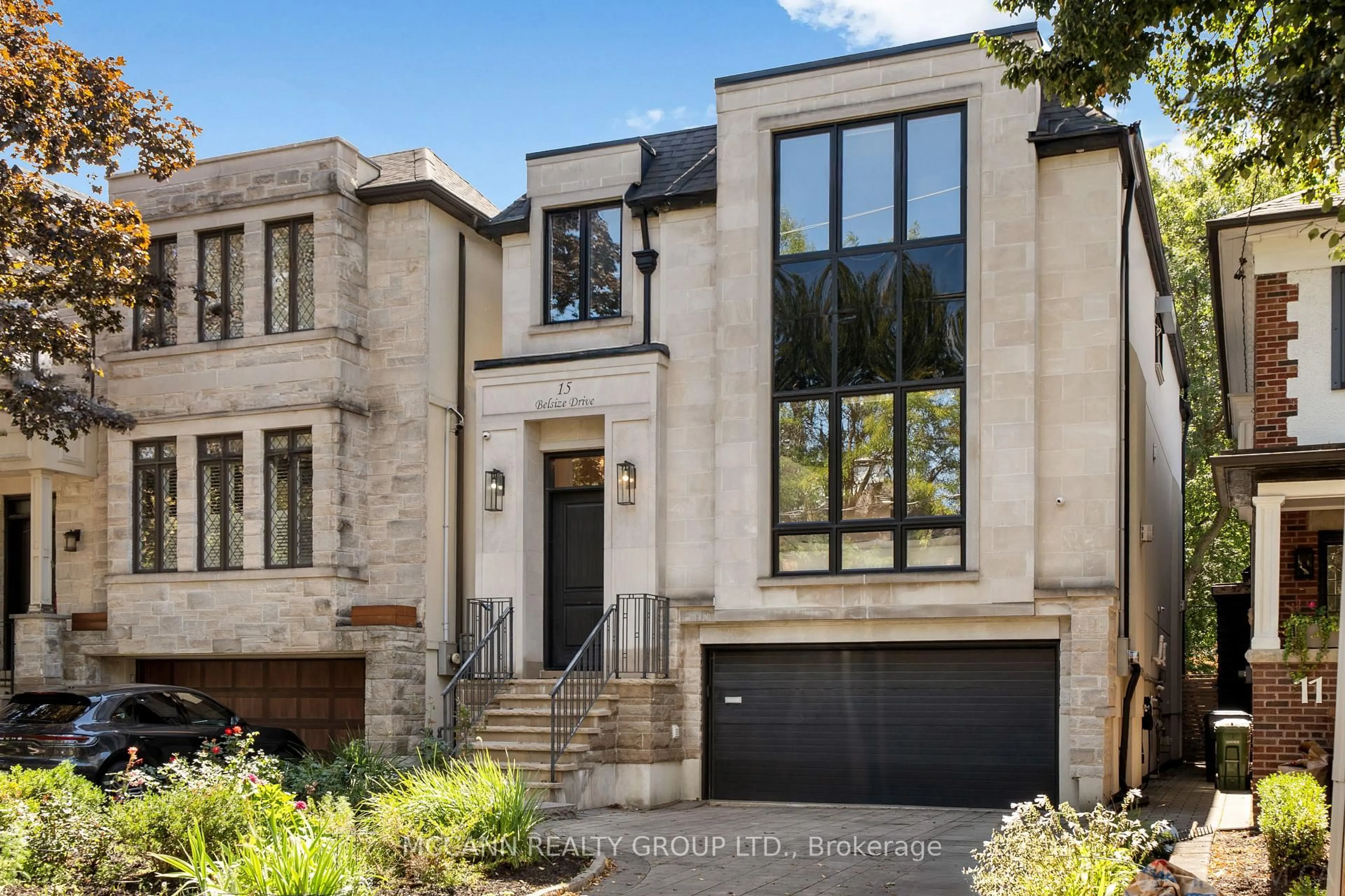 Home with brick exterior material, street for 15 Belsize Dr, Toronto Ontario M4S 1L3