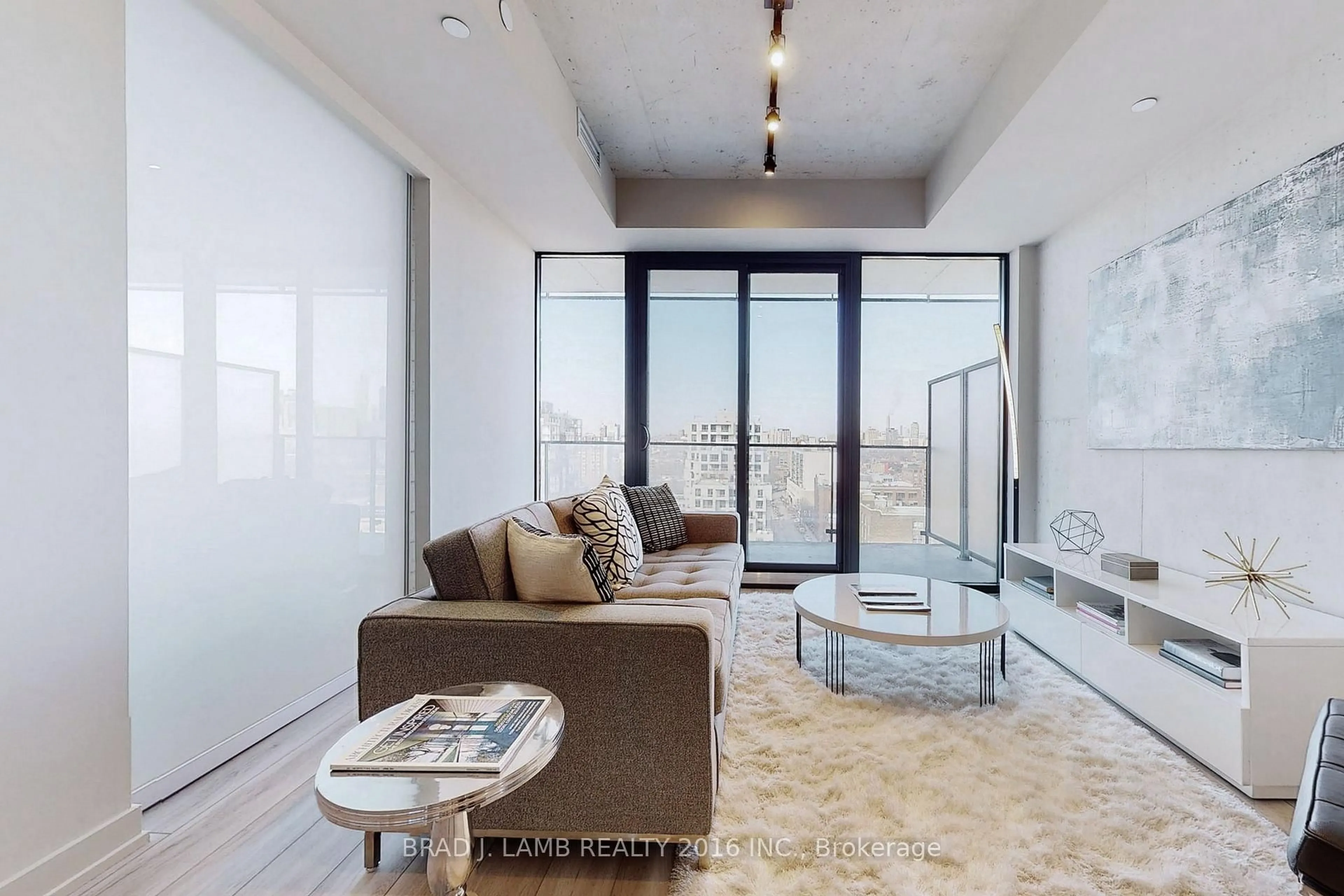 Living room with furniture, cement floor for 458 Richmond St #1601, Toronto Ontario M5V 0S9