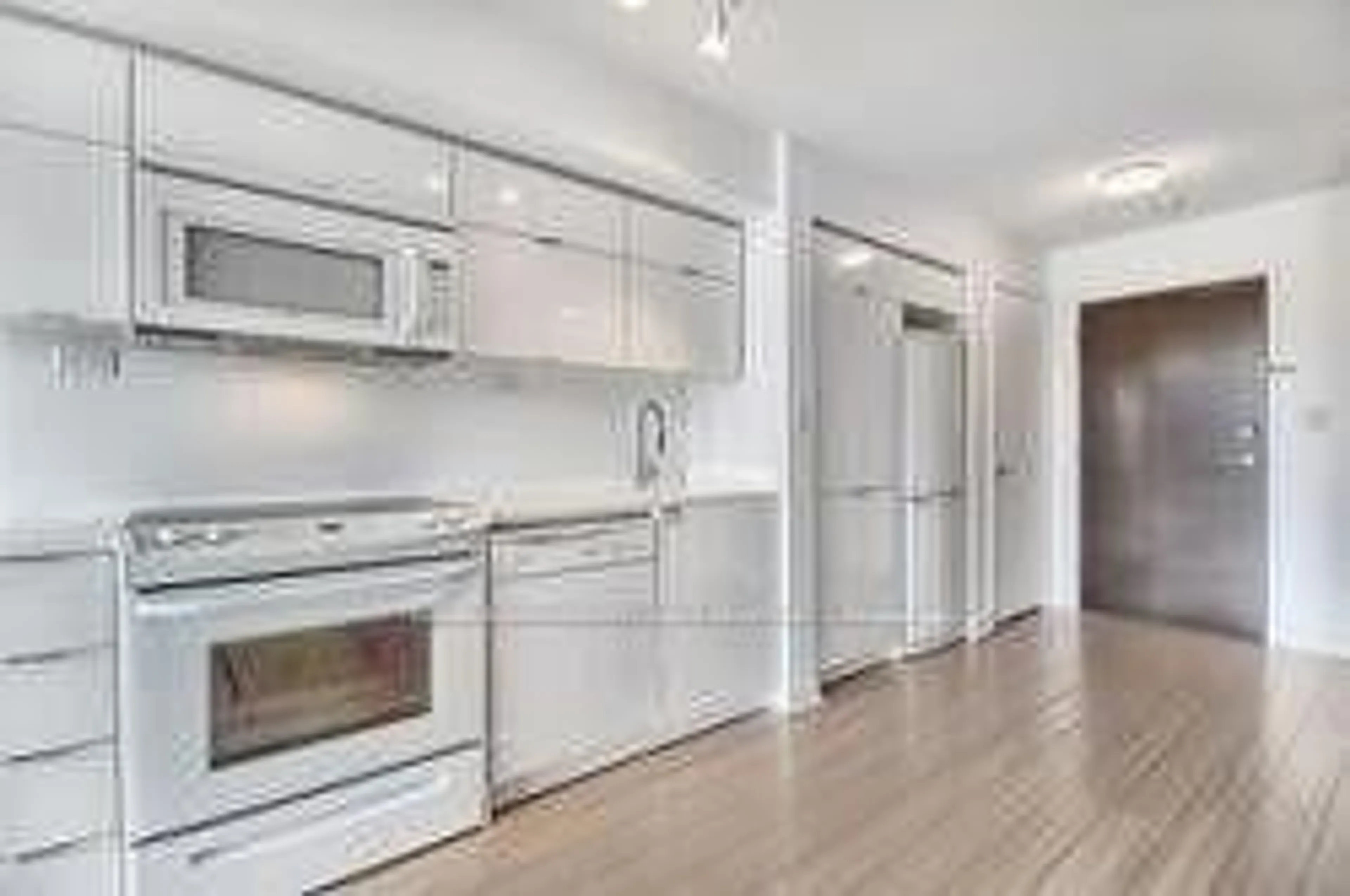 Open concept kitchen, wood/laminate floor for 151 Dan Leckie Way #717, Toronto Ontario M5V 4B2