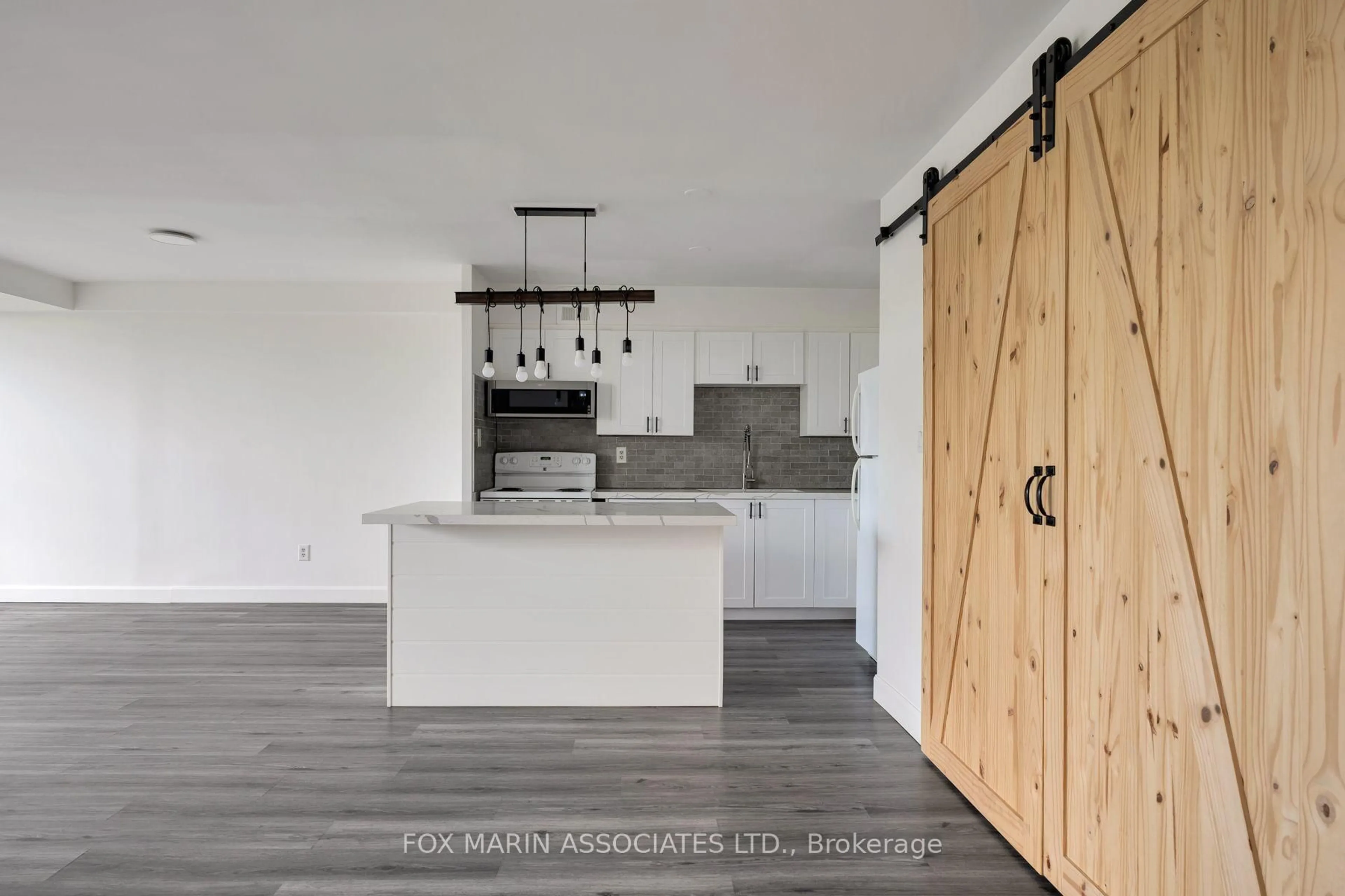 Open concept kitchen, unknown for 20 Edgecliff Gfwy #312, Toronto Ontario M3C 3A4