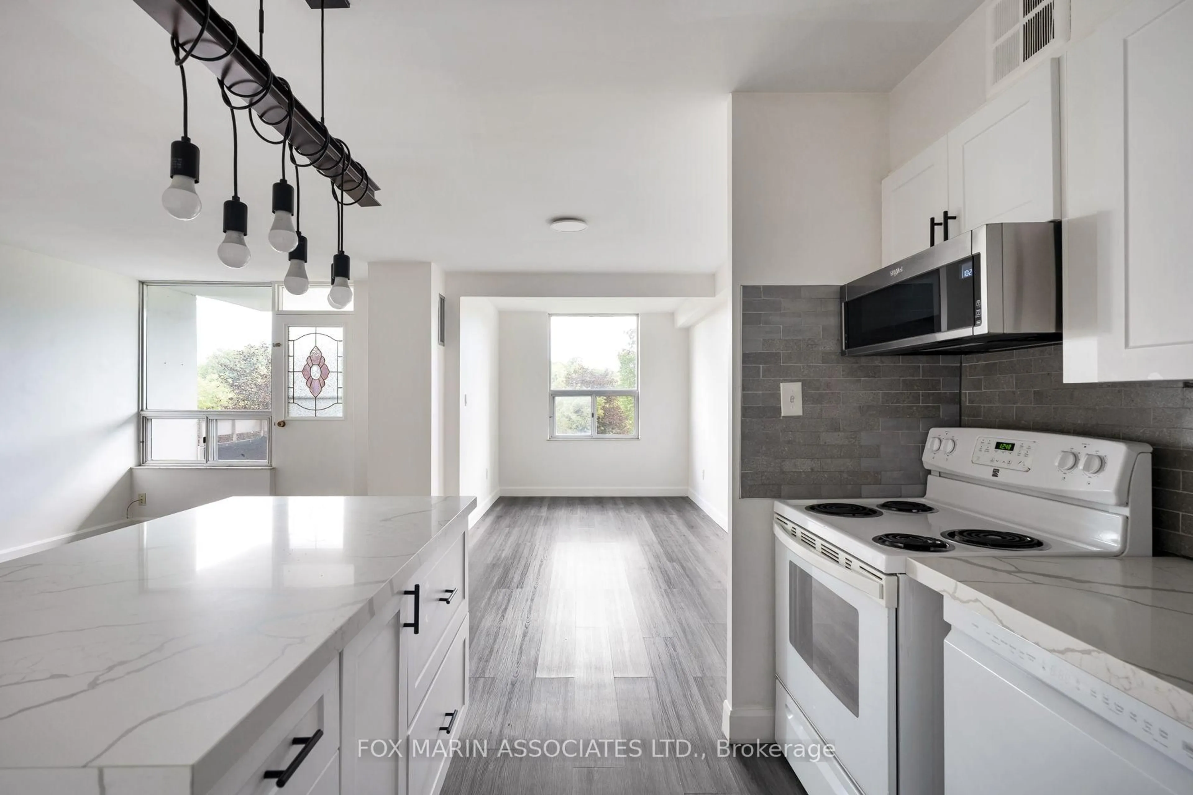 Open concept kitchen, unknown for 20 Edgecliff Gfwy #312, Toronto Ontario M3C 3A4