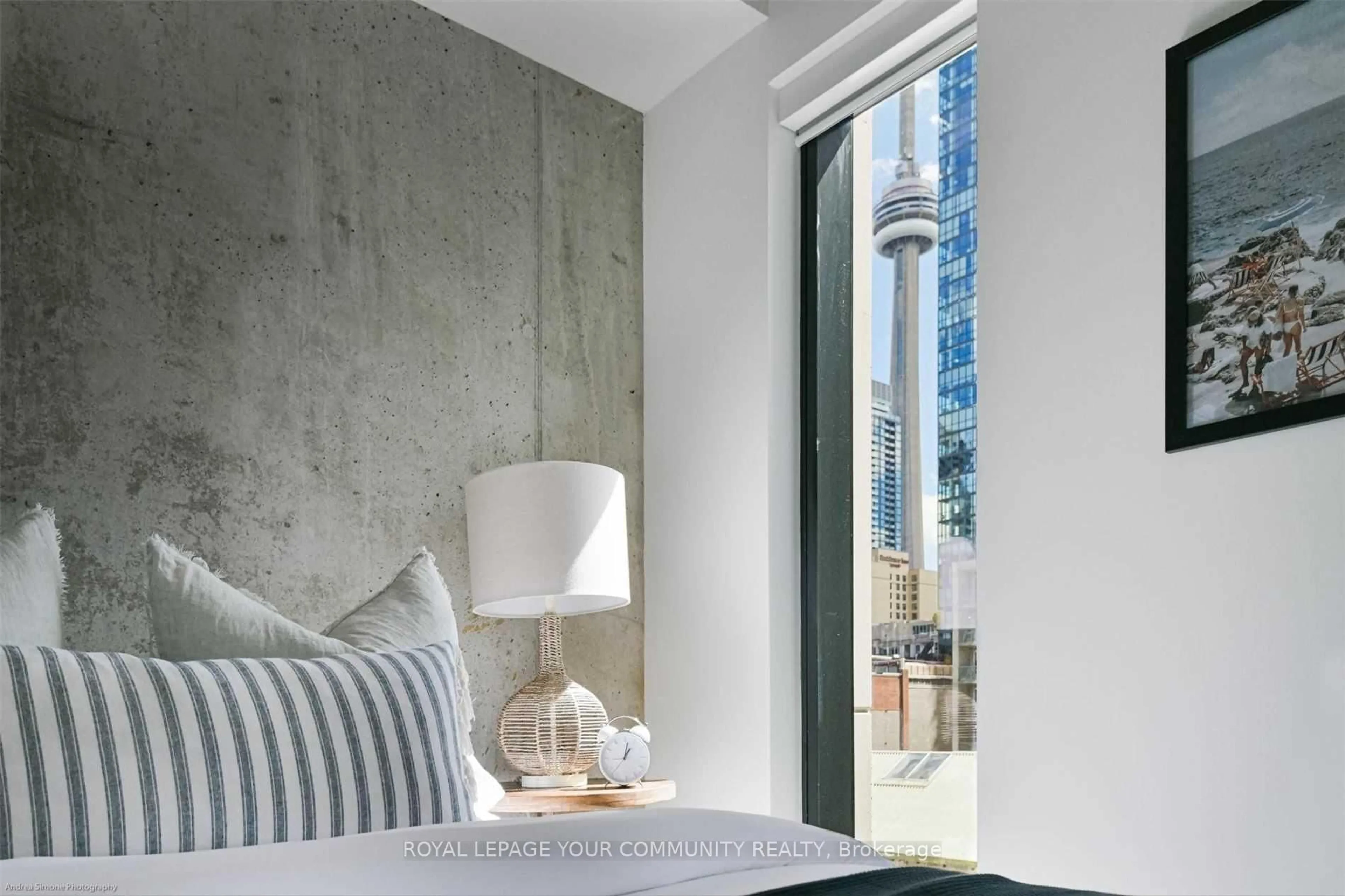 Bedroom with bed, cement floor for 11 Charlotte St #403, Toronto Ontario M5V 2H5