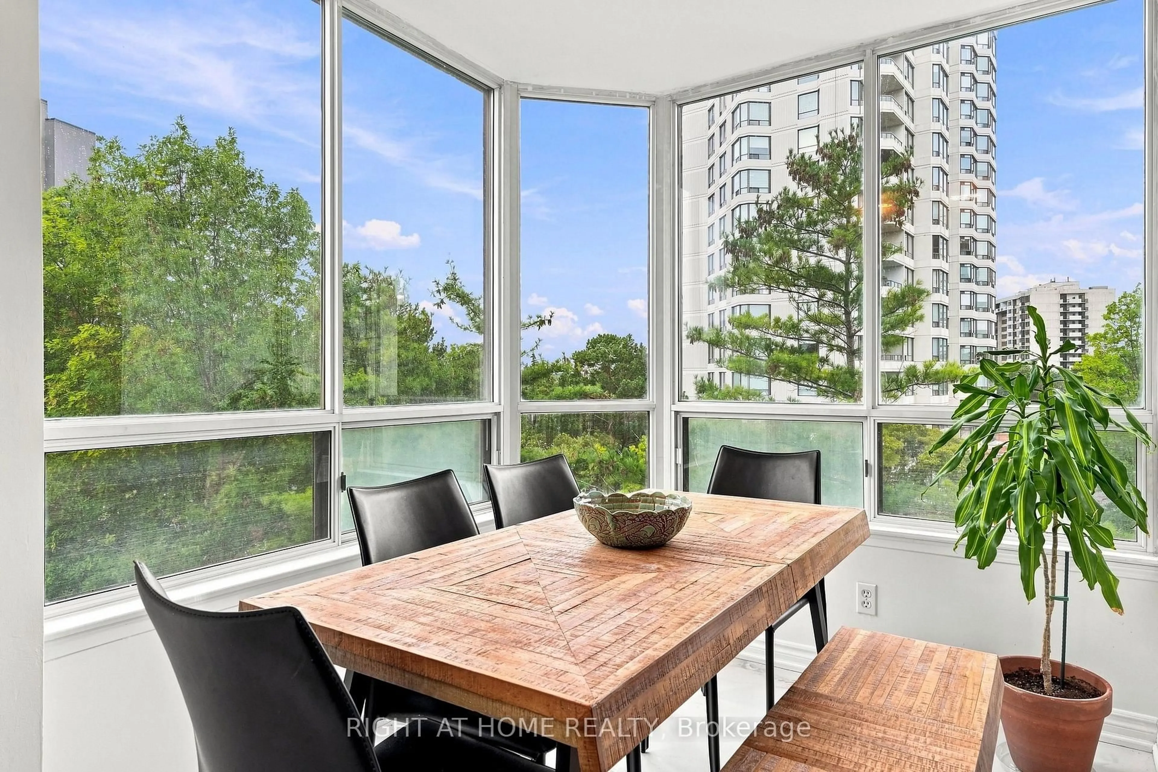 Dining room, wood/laminate floor for 1101 Steeles Ave #411, Toronto Ontario M2R 3W5