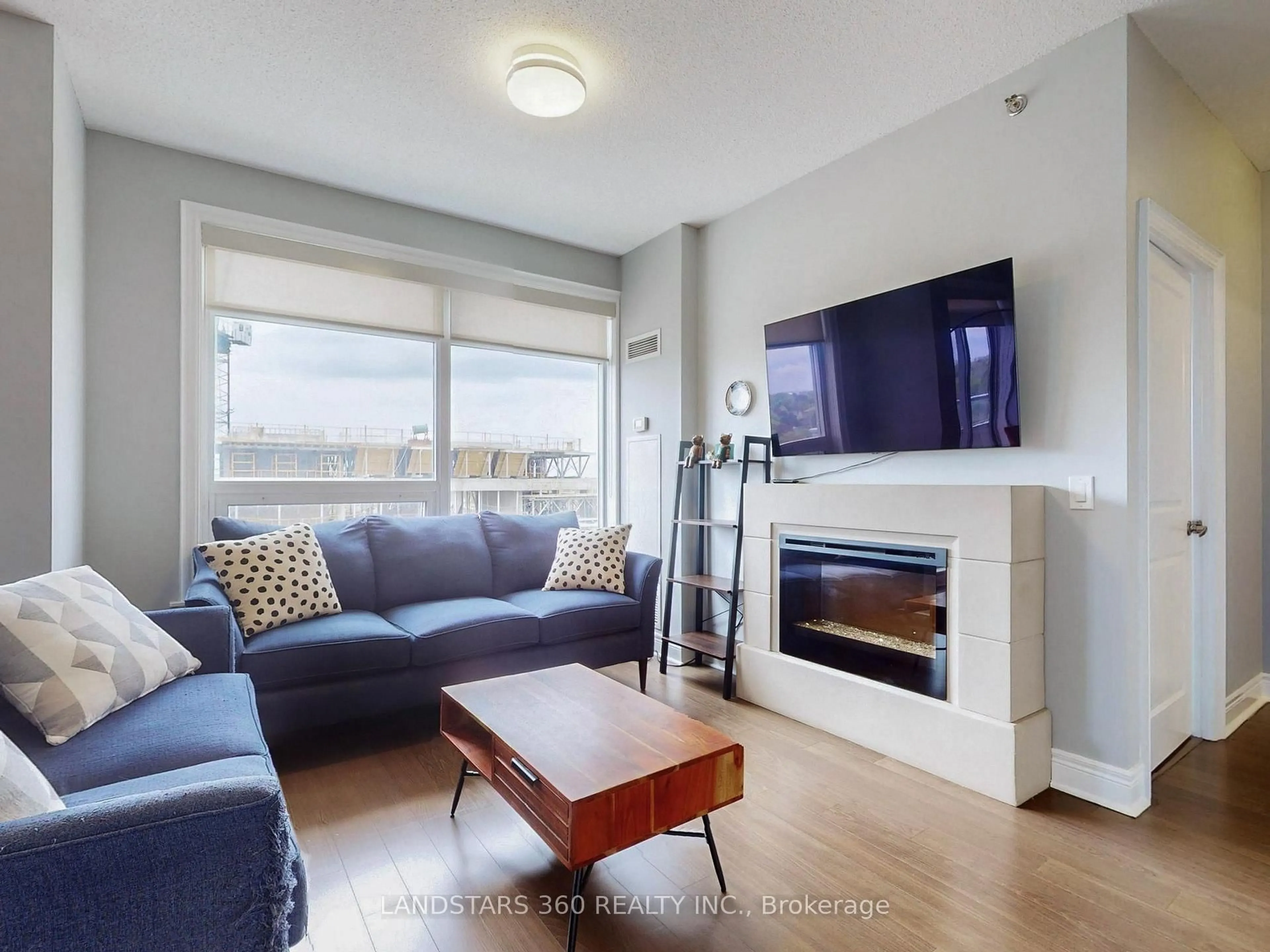 Living room with furniture, wood/laminate floor for 701 Sheppard Ave #803, Toronto Ontario M3H 0B2