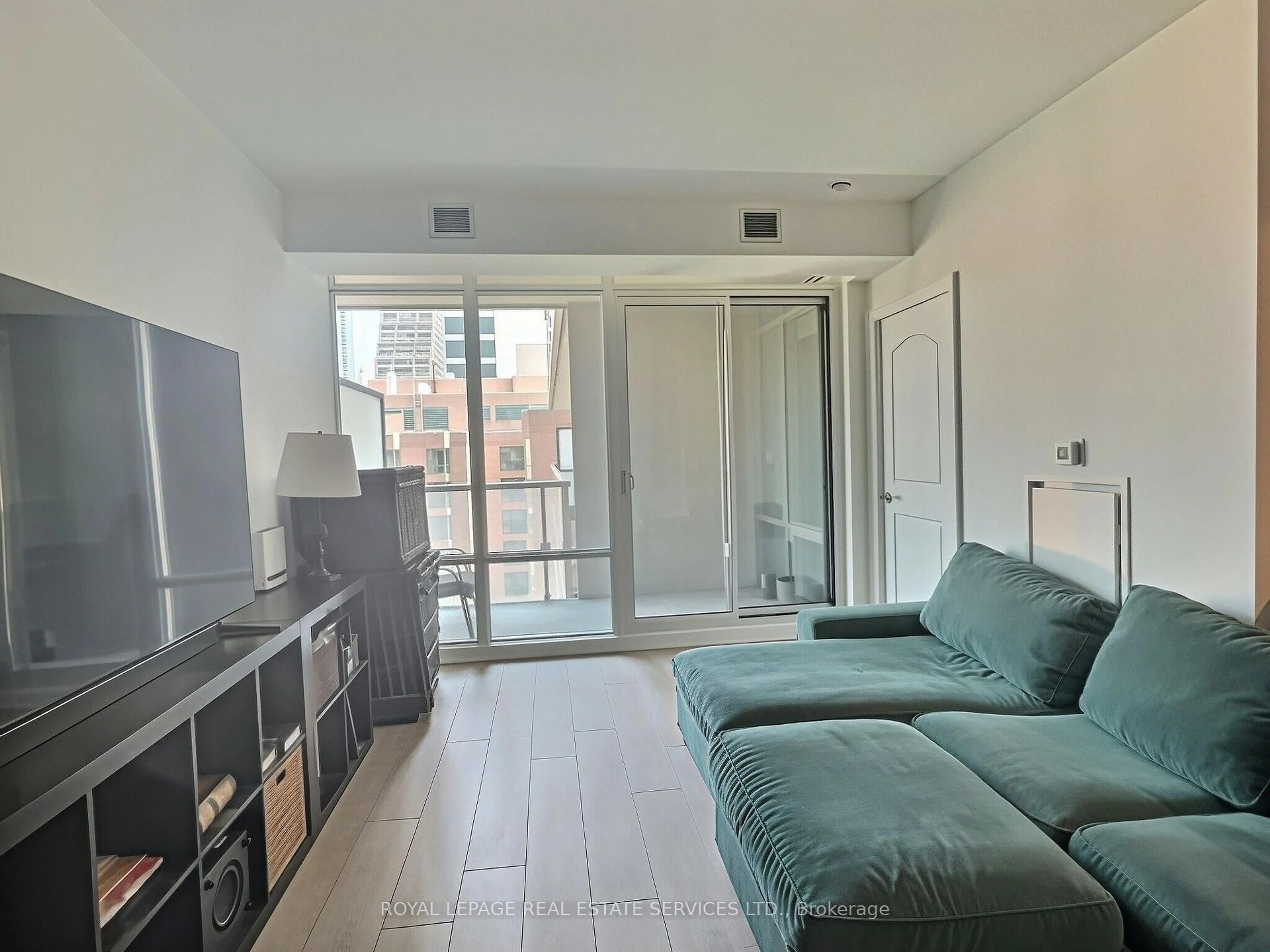 Living room with furniture, unknown for 1 Bedford Rd #701, Toronto Ontario M5R 2B5