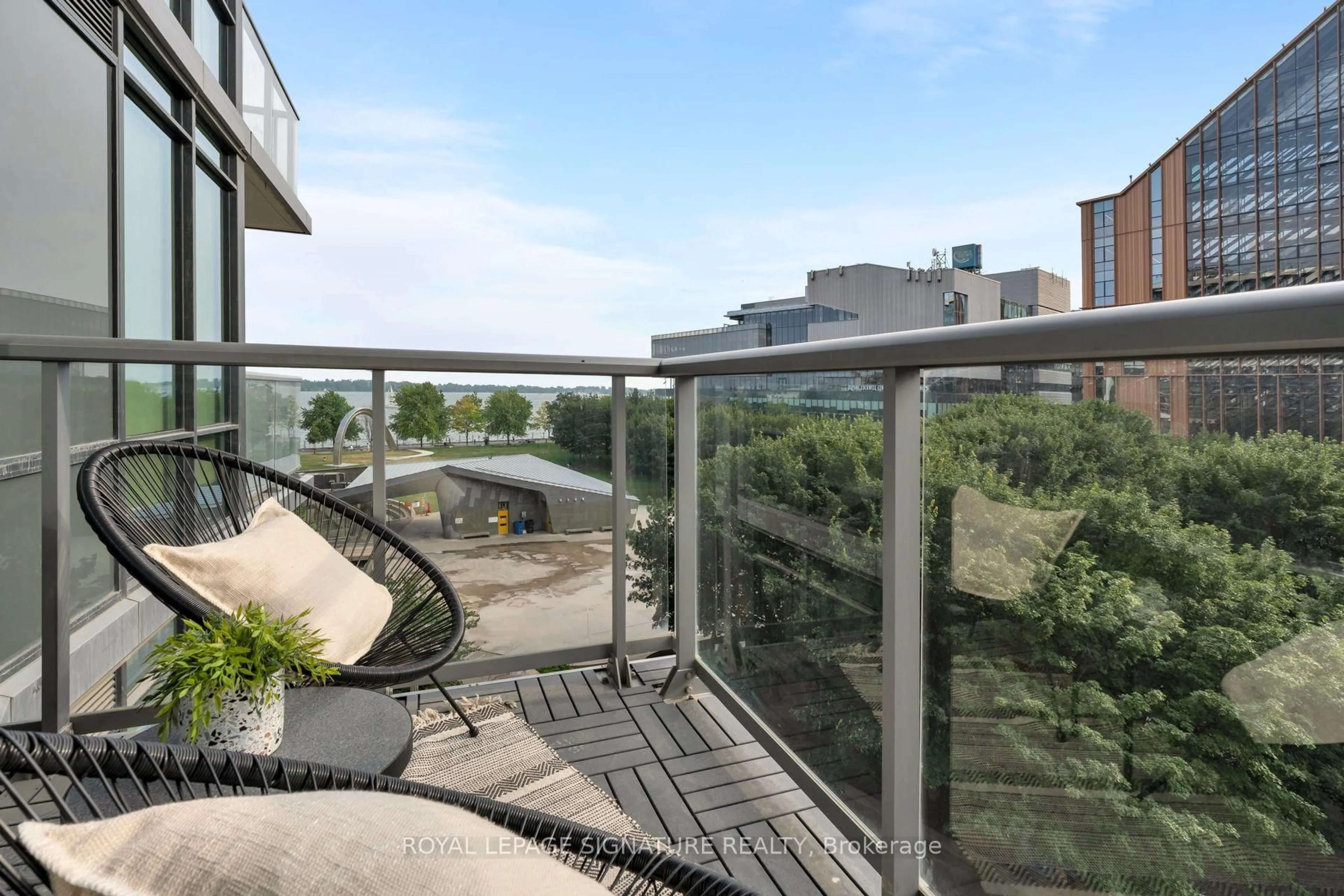 Balcony in the apartment, city buildings view from balcony for 15 Merchants' Wharf #442, Toronto Ontario M5A 0N8