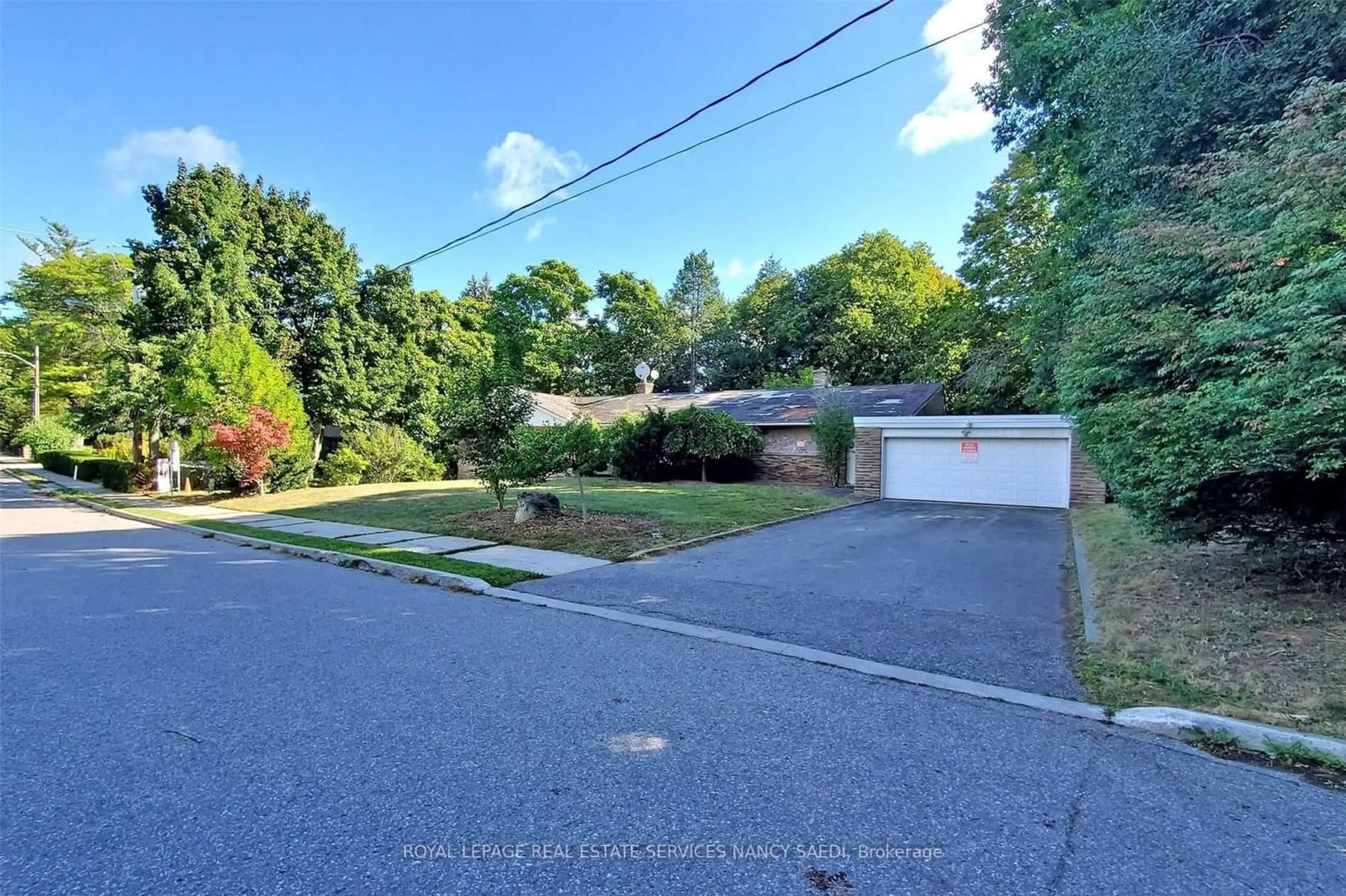 A pic from exterior of the house or condo, the street view for 38 Salonica Rd, Toronto Ontario M3C 2L9