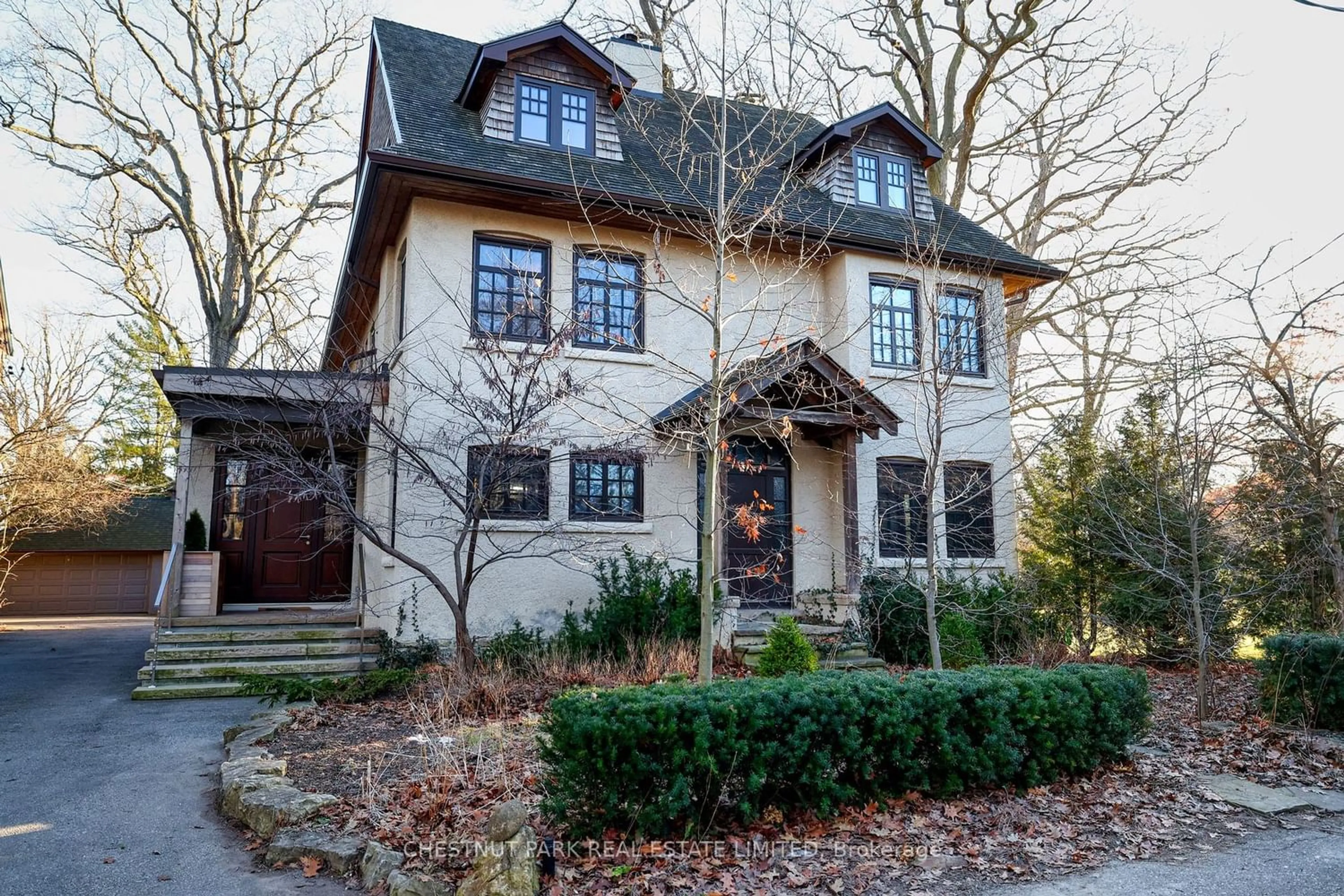 Home with stone exterior material for 17 Wychwood Park, Toronto Ontario M6G 2V5