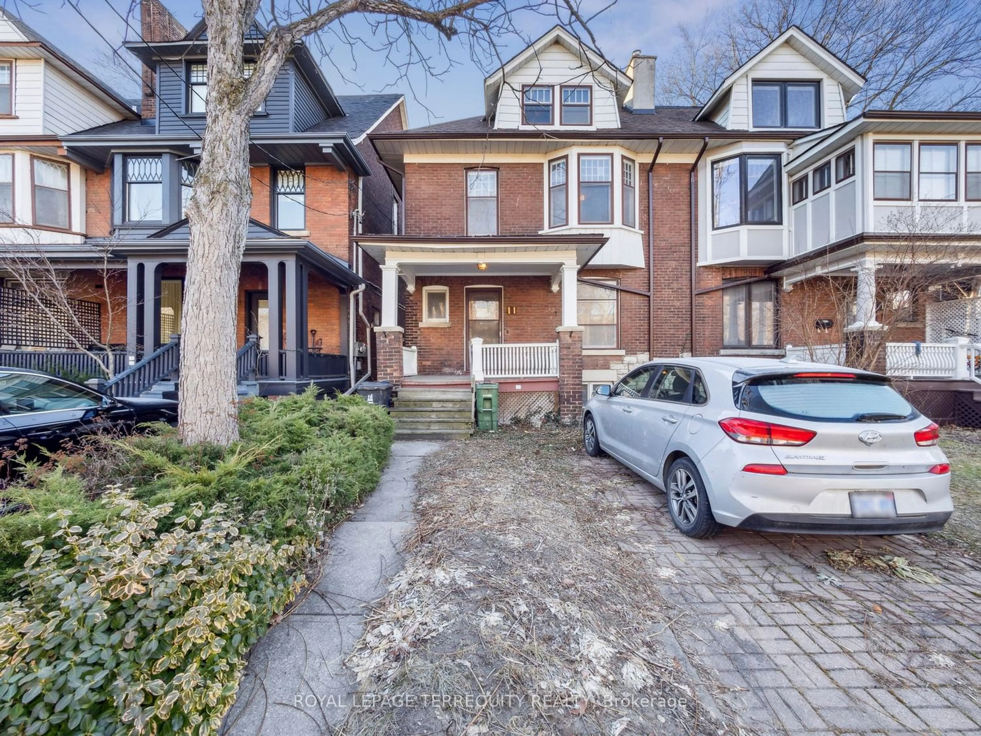 Home with brick exterior material for 11 Barton Ave, Toronto Ontario M5R 1G7