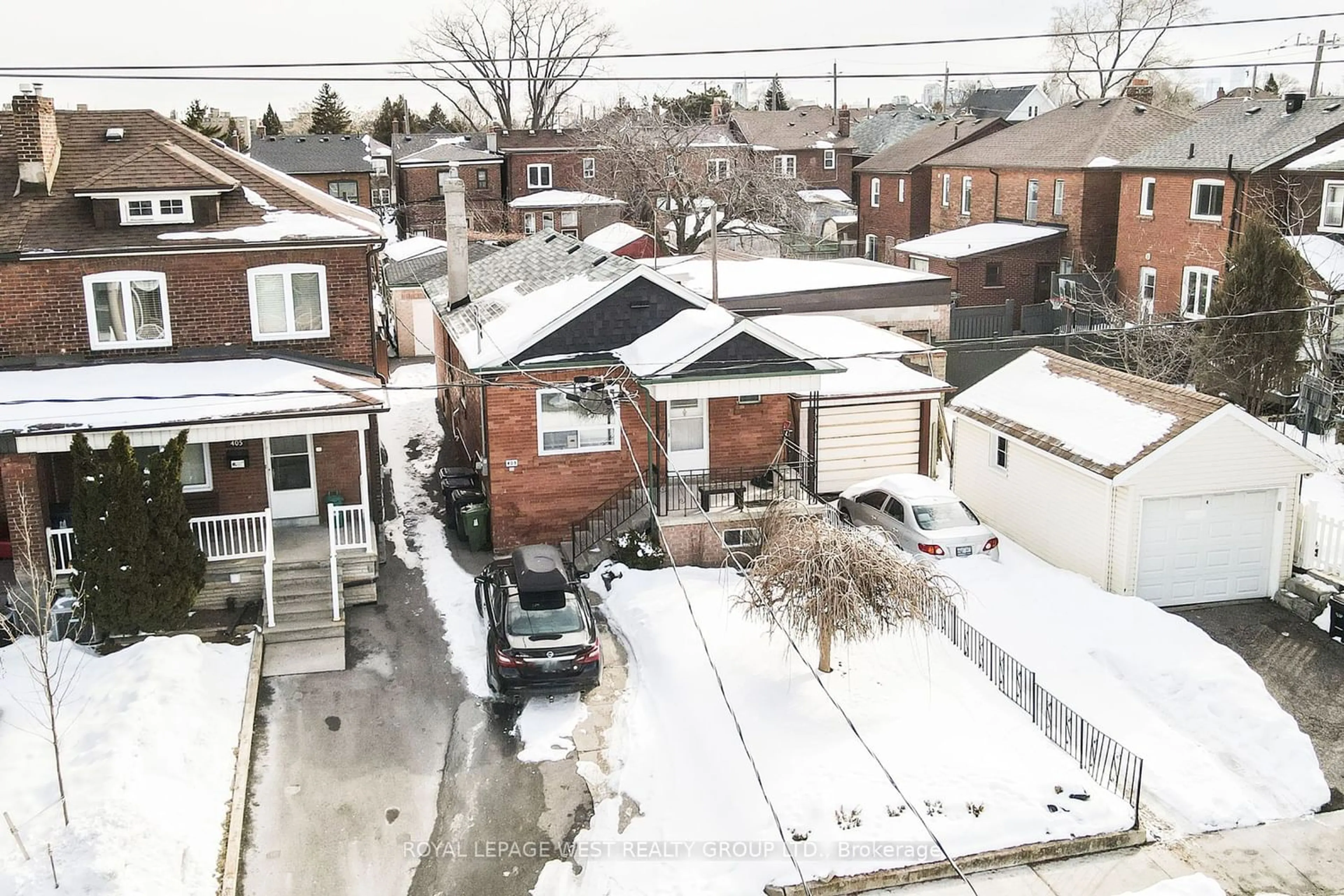 Frontside or backside of a home for 403 Northcliffe Blvd, Toronto Ontario M6E 3L3
