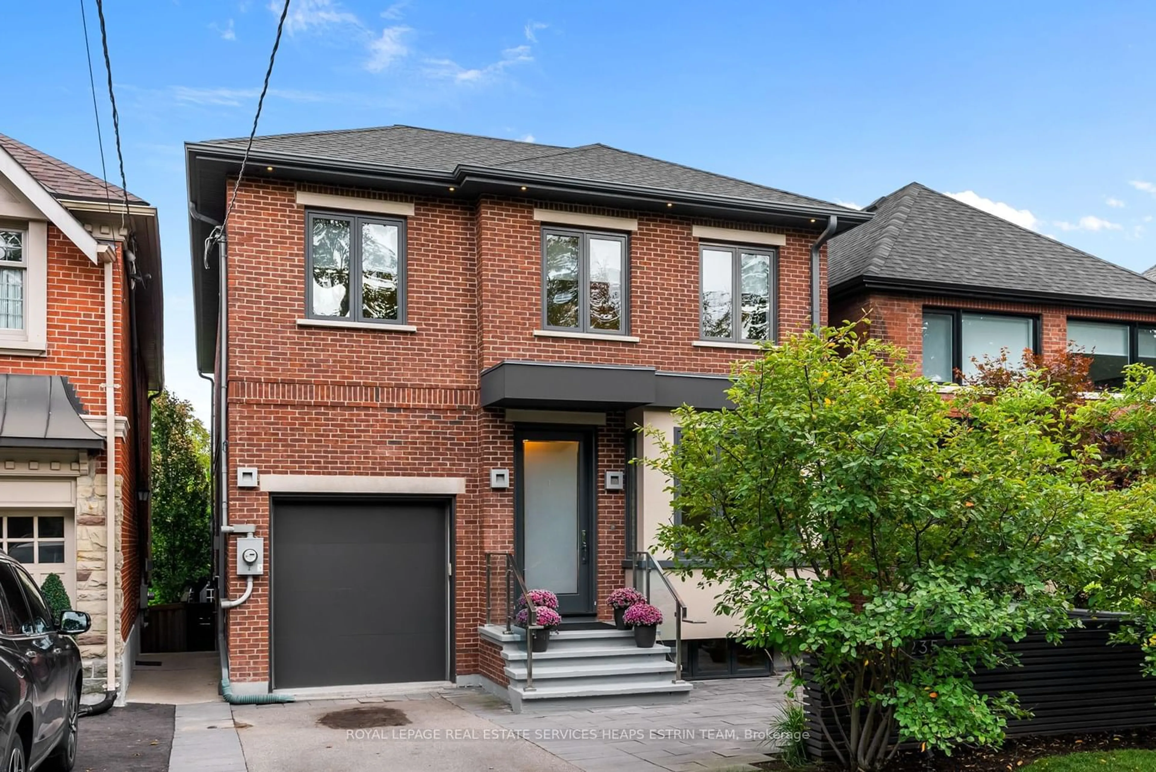 Home with brick exterior material for 235 Bessborough Dr, Toronto Ontario M4G 3K4