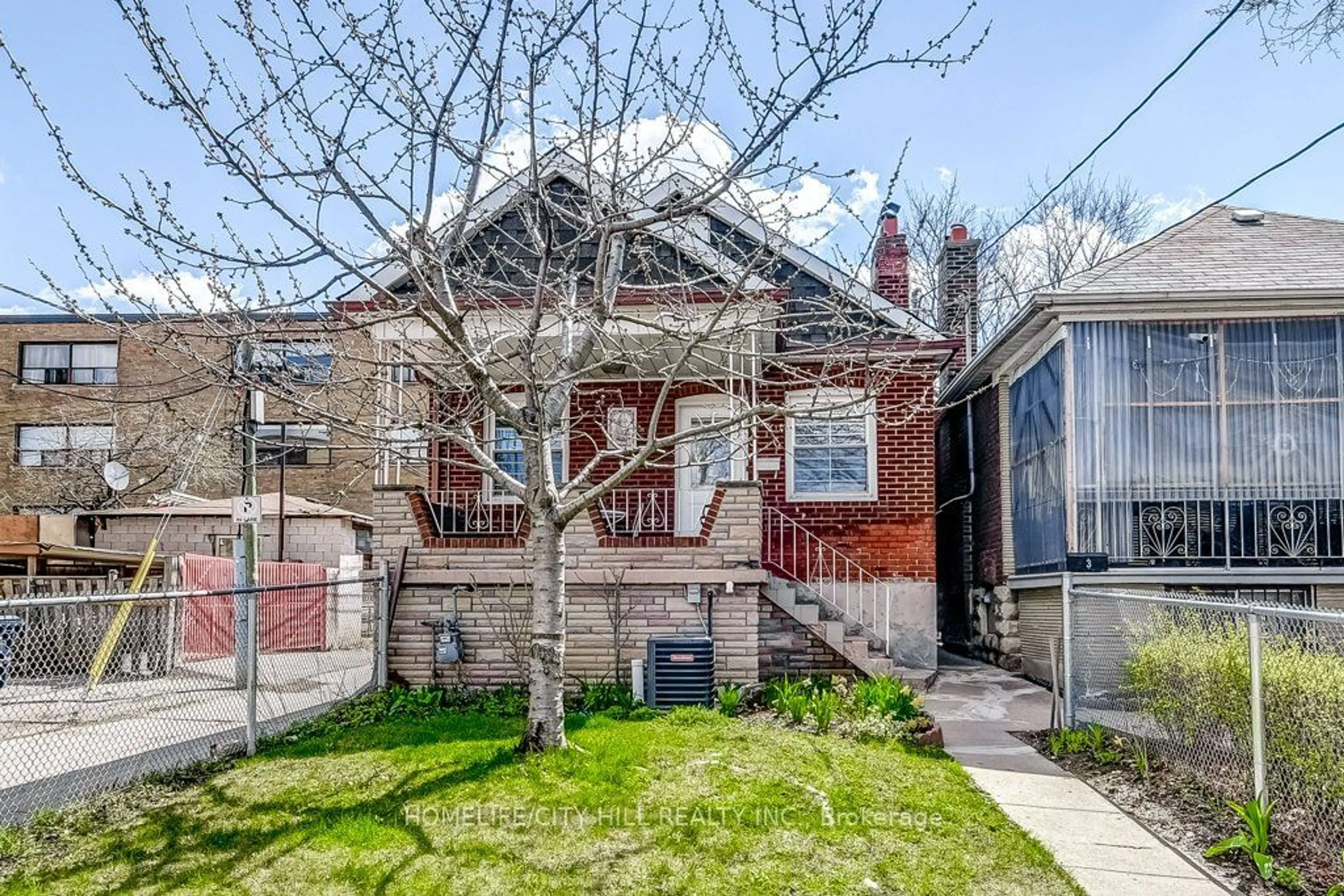 Frontside or backside of a home for 1 Bansley Ave, Toronto Ontario M6E 2A1