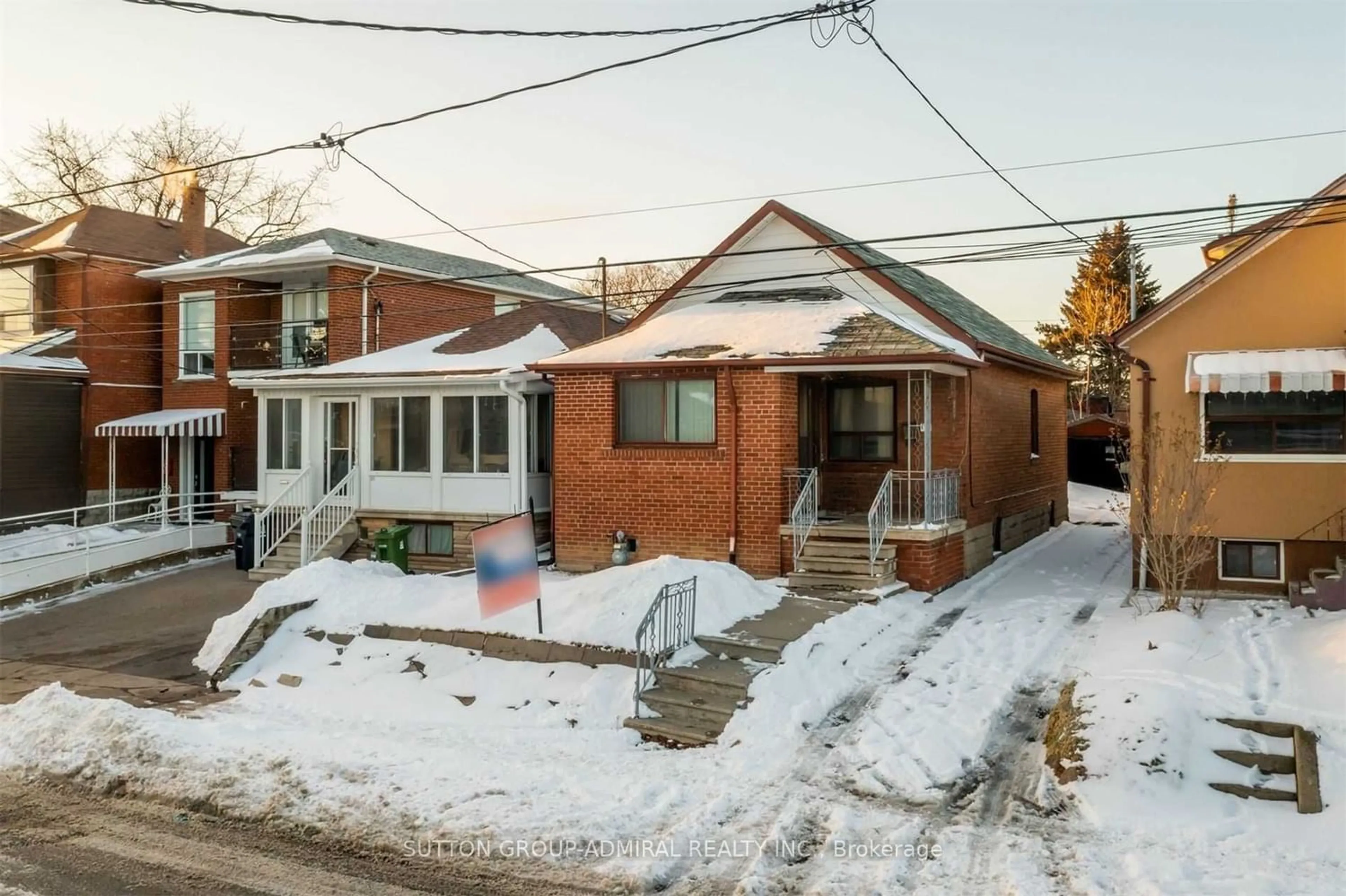 Frontside or backside of a home for 110 Clovelly Ave, Toronto Ontario M6E 2E6