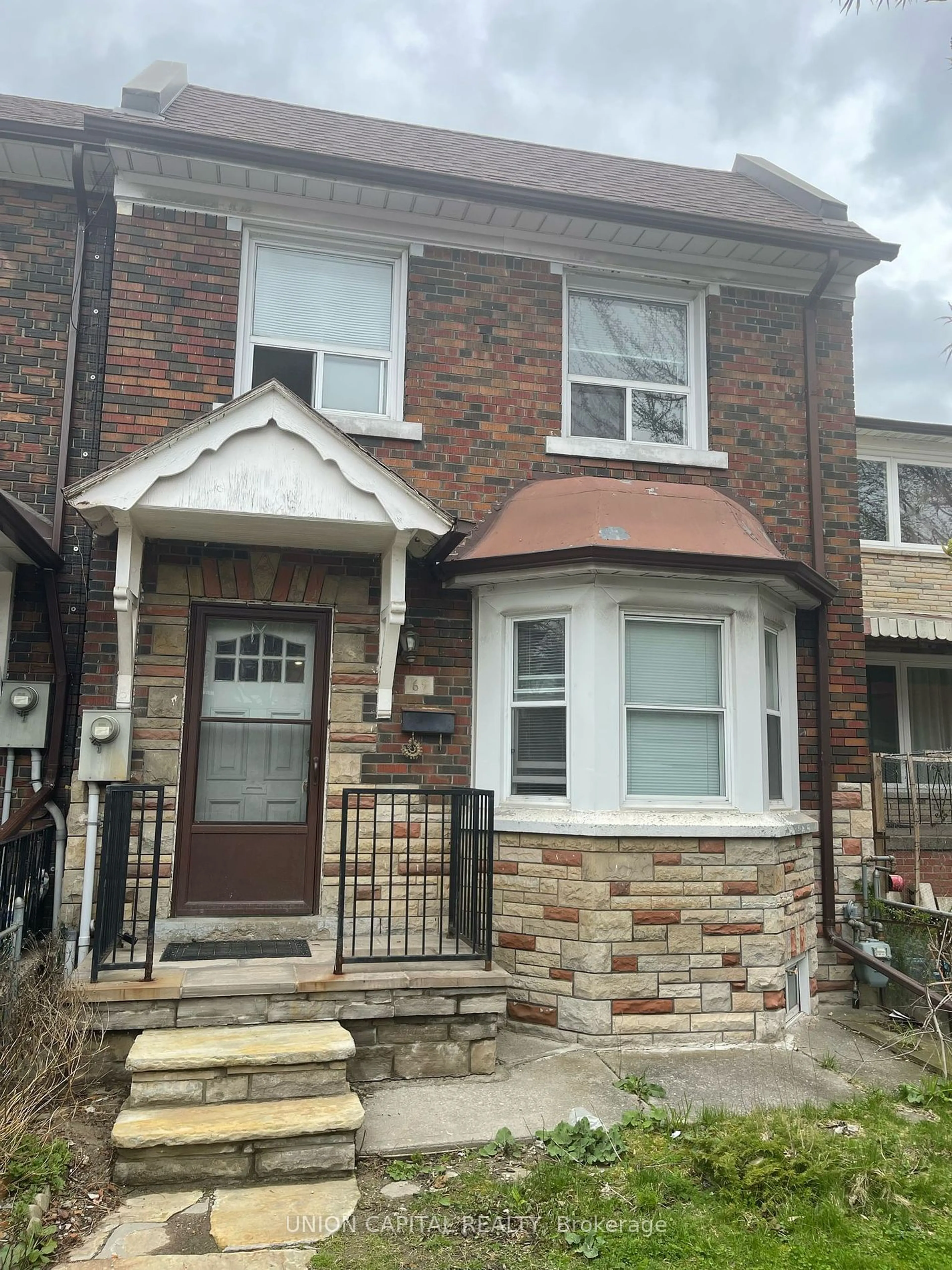 Home with brick exterior material for 69 Denison Ave, Toronto Ontario M5T 2M7
