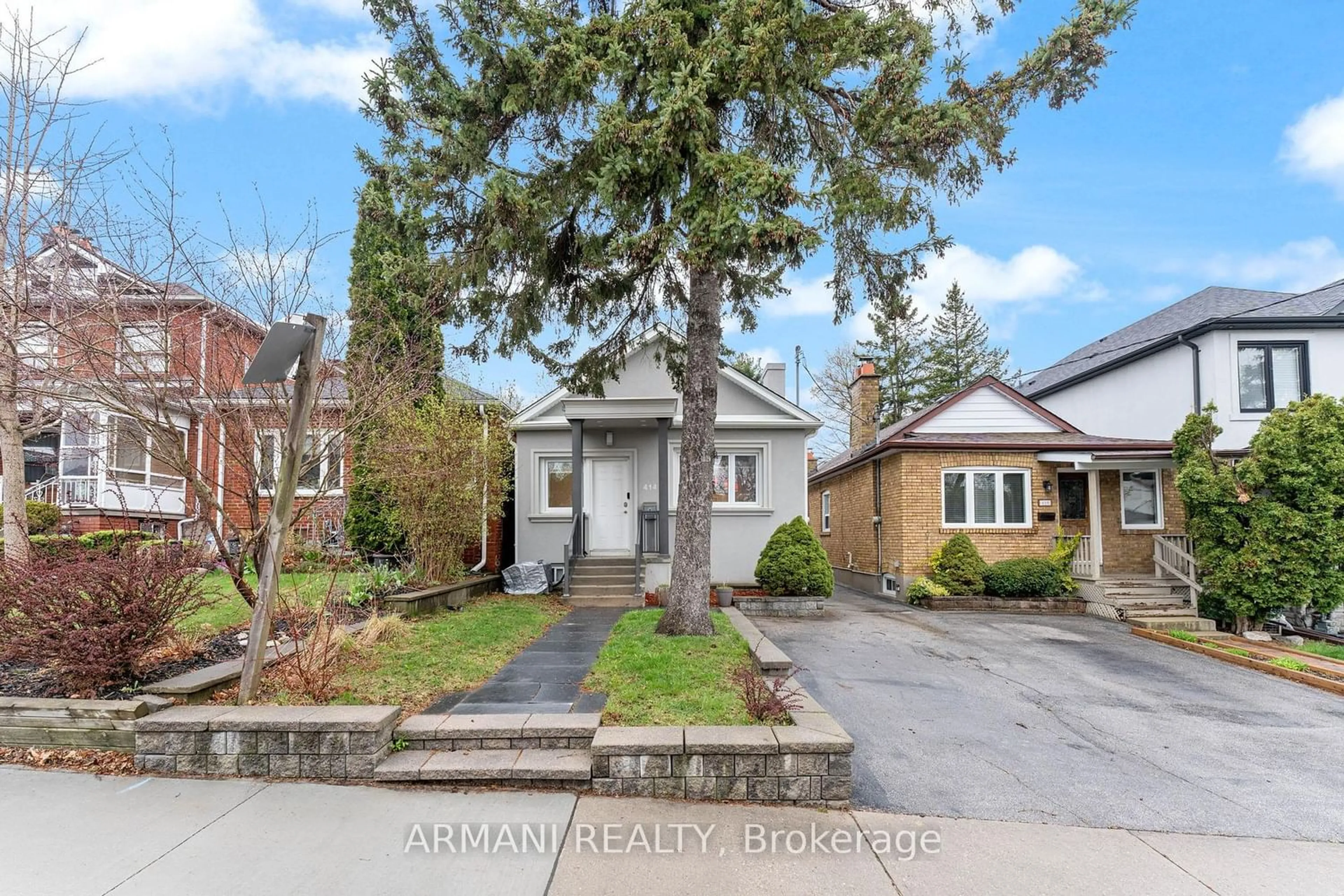 Frontside or backside of a home for 414 Northcliffe Blvd, Toronto Ontario M6E 3L2