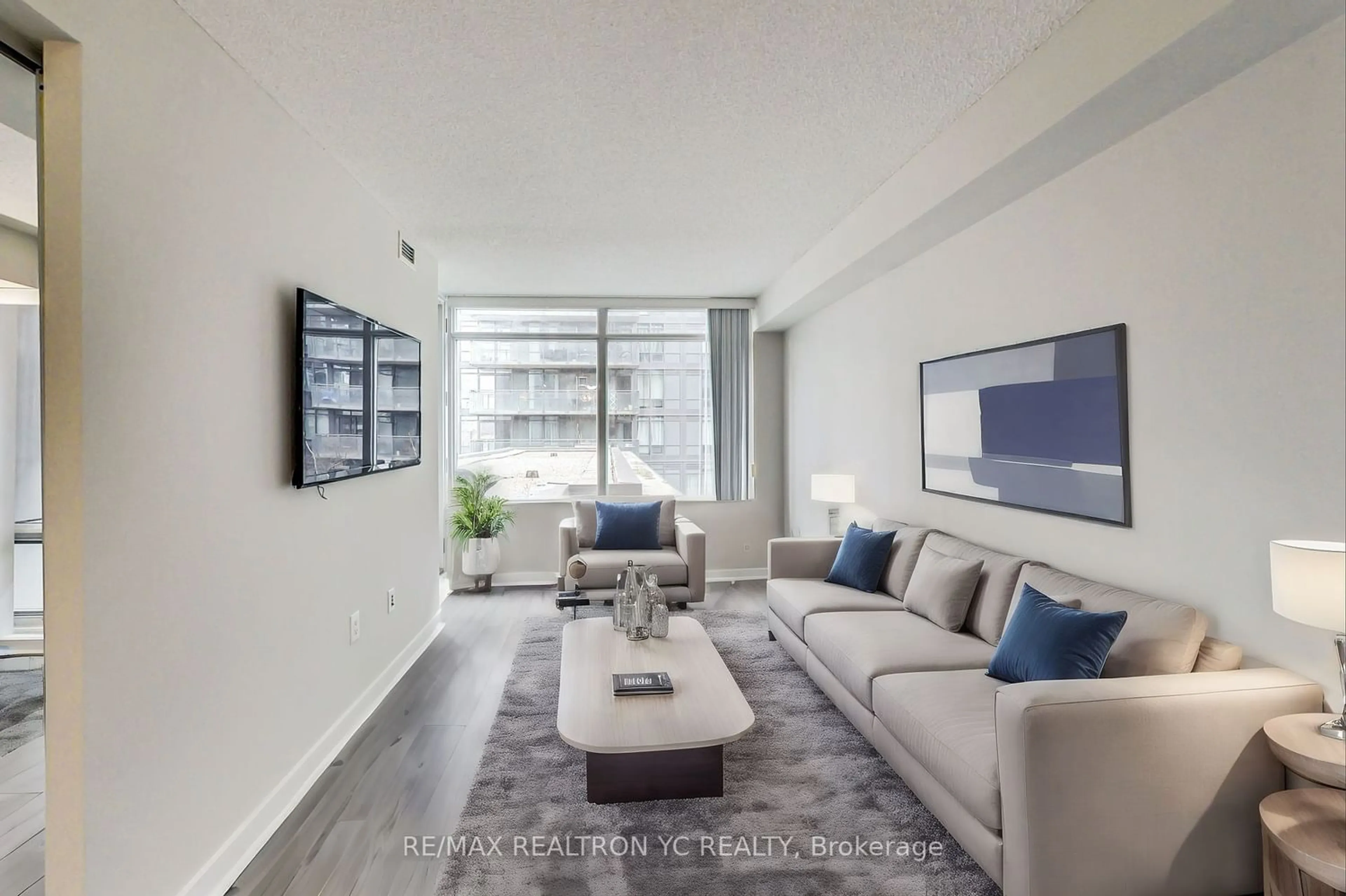 Living room for 25 Telegram Mews #303, Toronto Ontario M5V 3Z1
