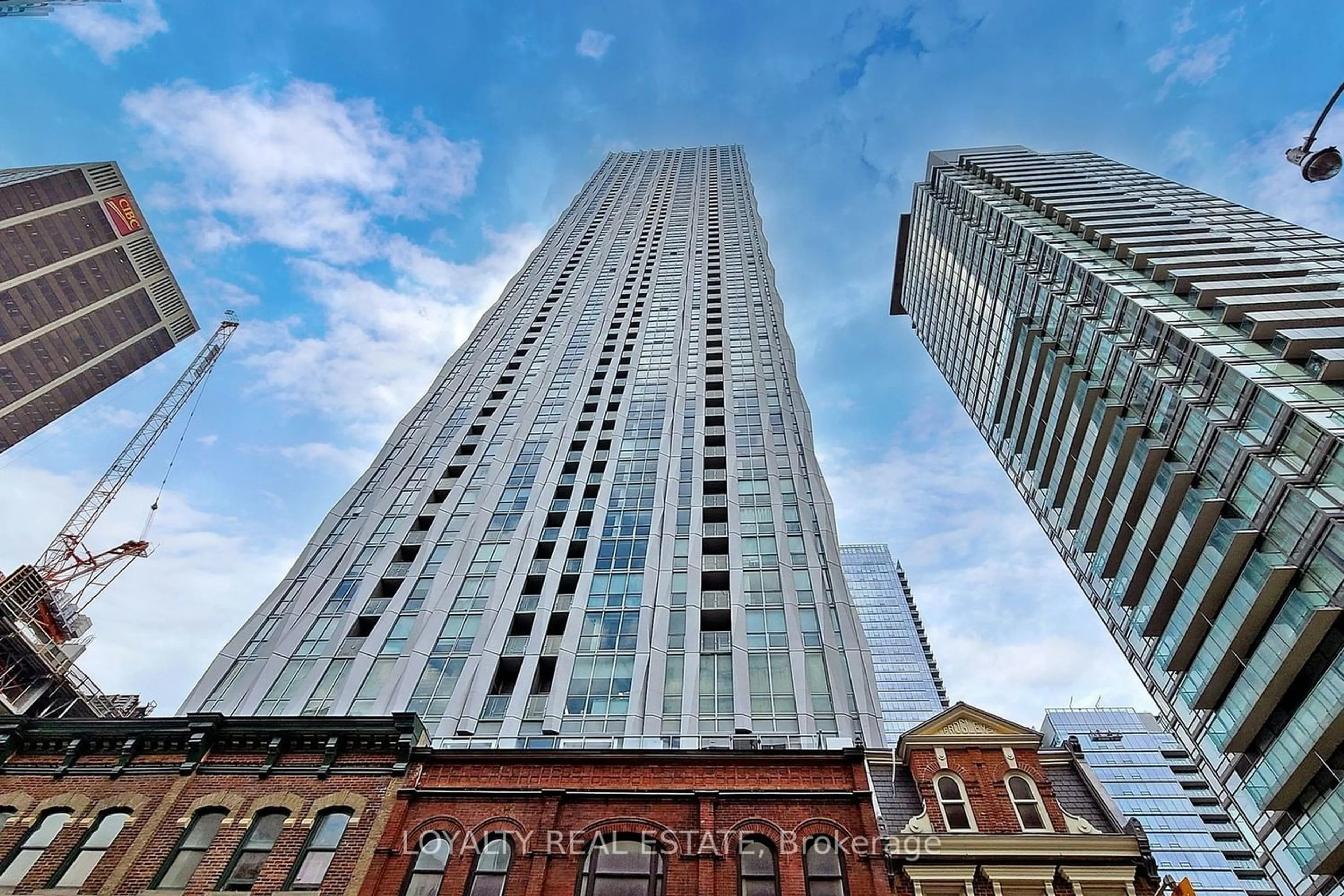 A pic from exterior of the house or condo for 1 Yorkville Ave #4909, Toronto Ontario M4W 1L1