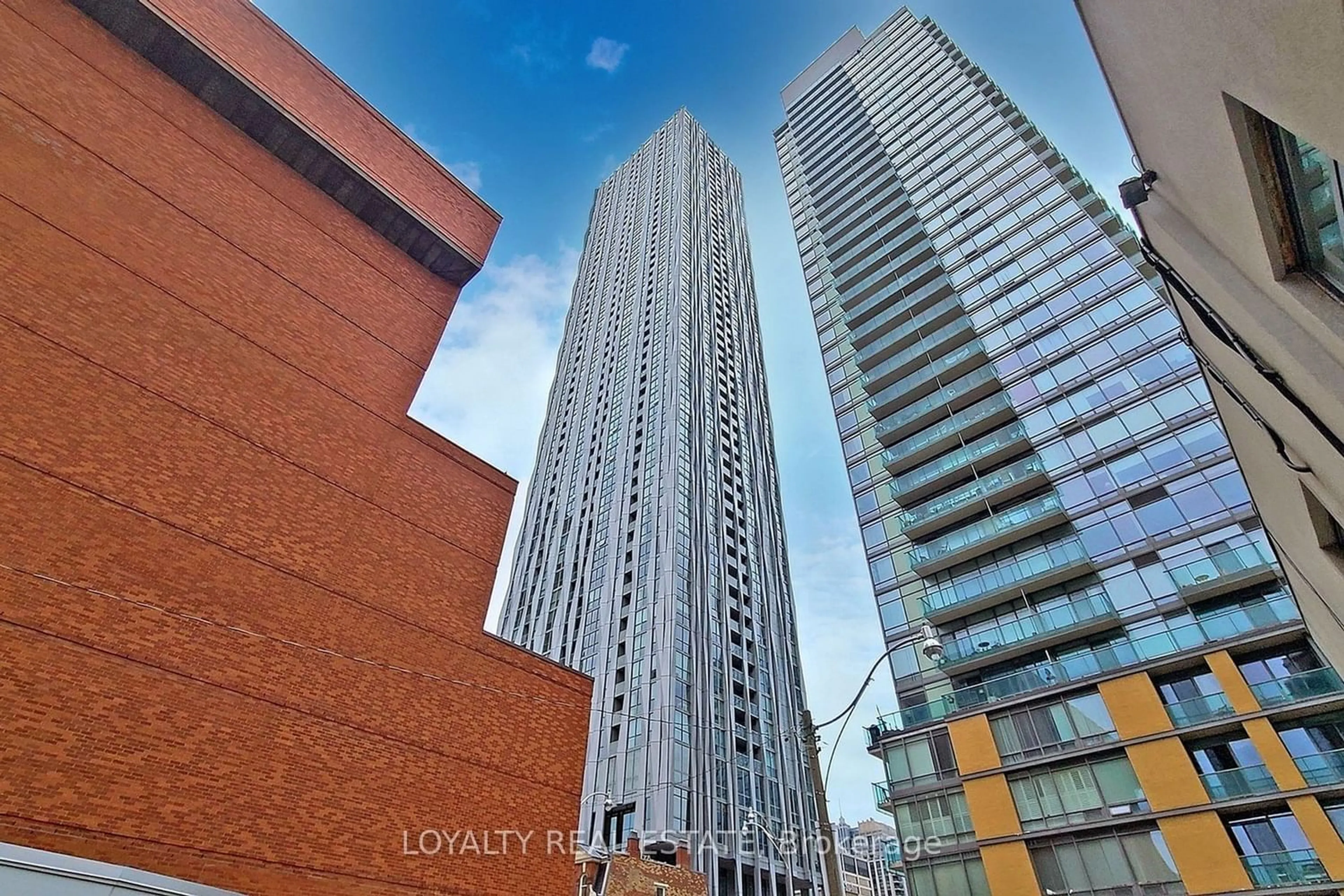 A pic from exterior of the house or condo for 1 Yorkville Ave #4909, Toronto Ontario M4W 1L1