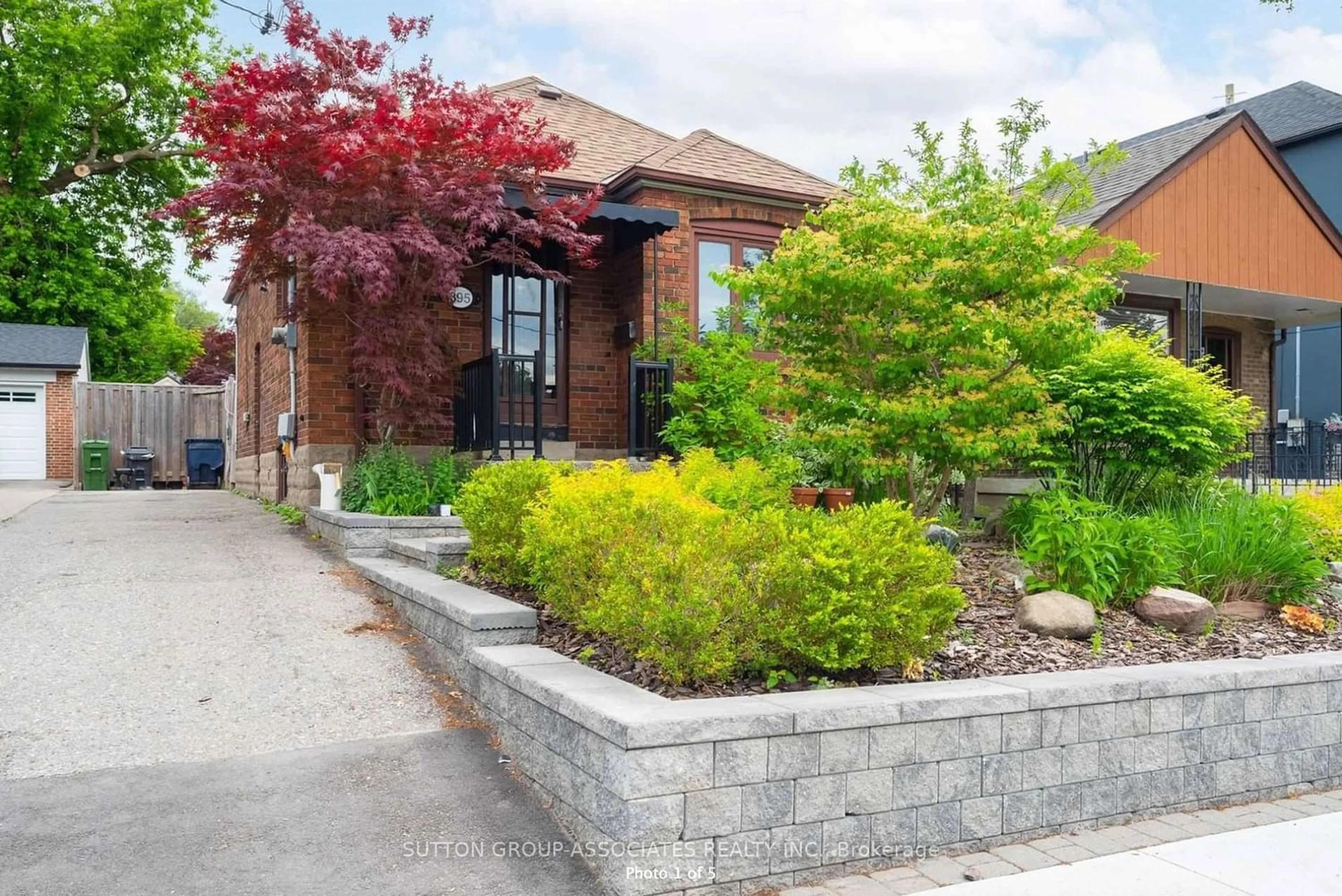 Home with brick exterior material for 395 Winnett Ave, Toronto Ontario M6C 3M2