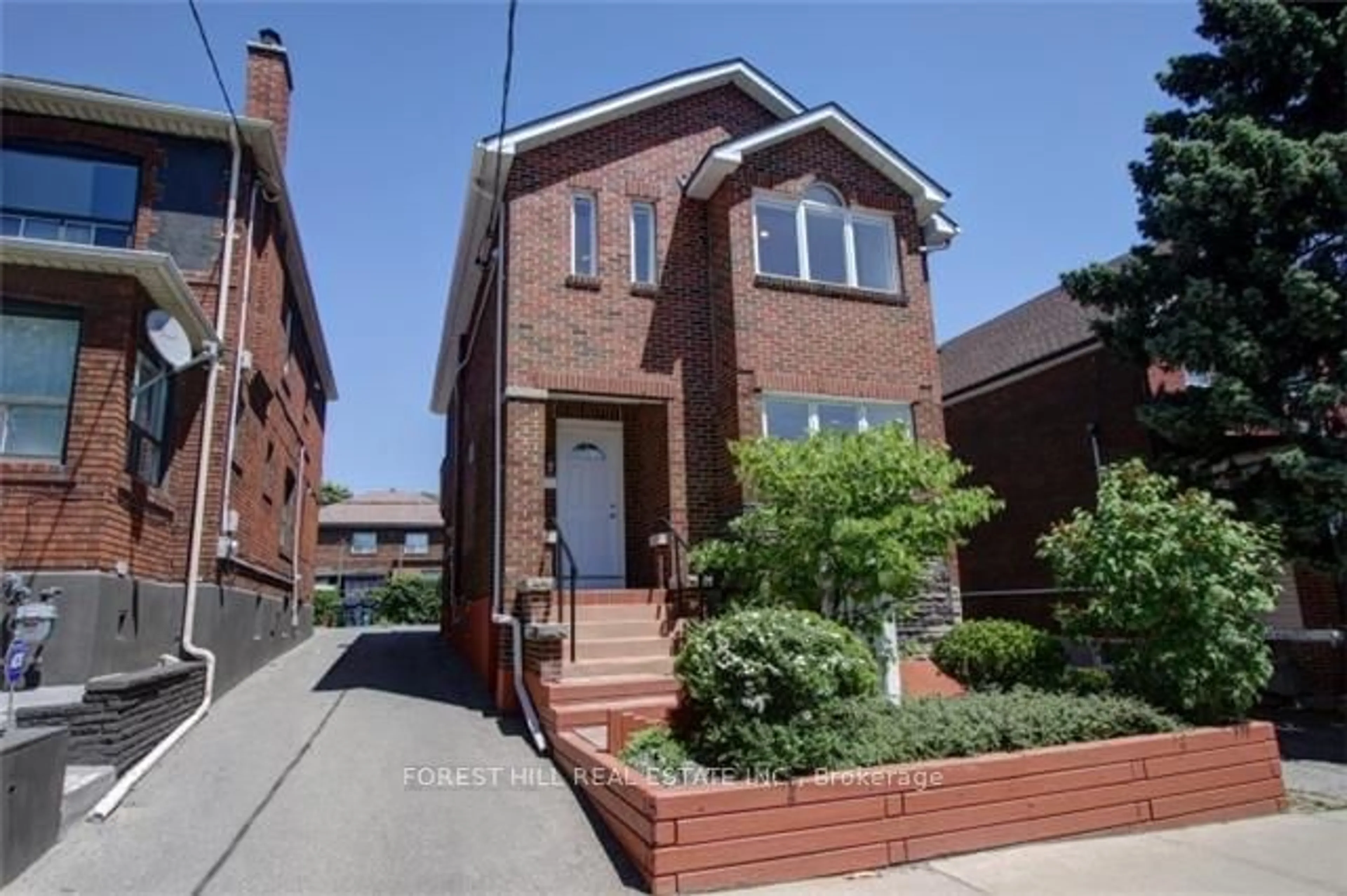 Home with brick exterior material for 447 Oakwood Ave, Toronto Ontario M6E 2W4