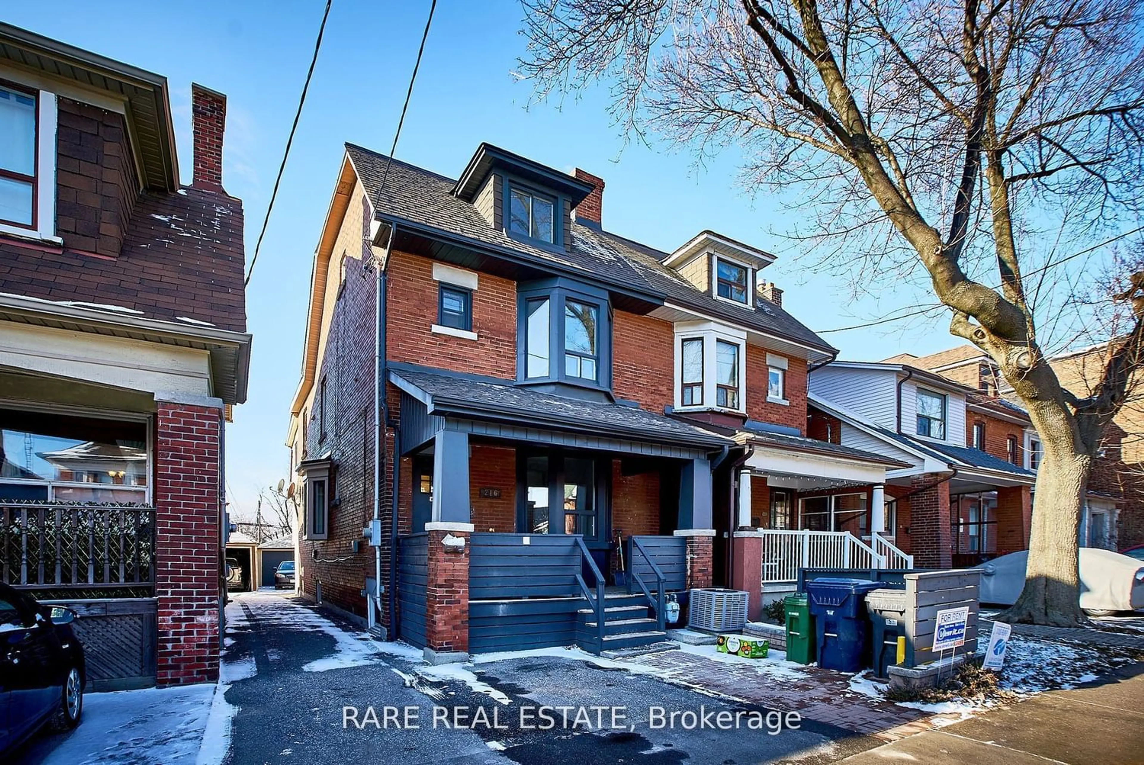 Home with brick exterior material for 216 Oakwood Ave, Toronto Ontario M6E 2V4