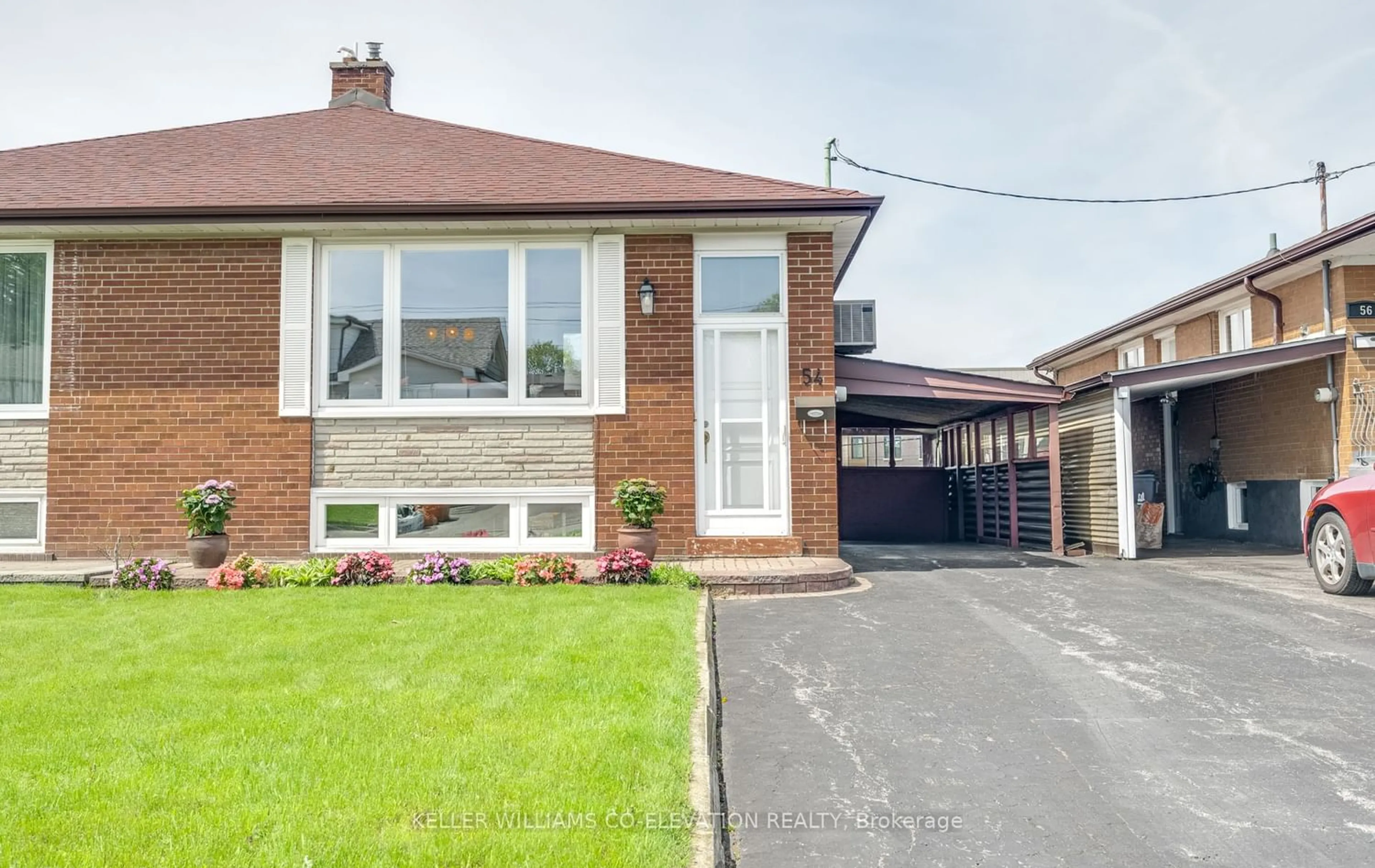 Home with brick exterior material for 54 Pinebrook Ave, Toronto Ontario M4A 1Z2