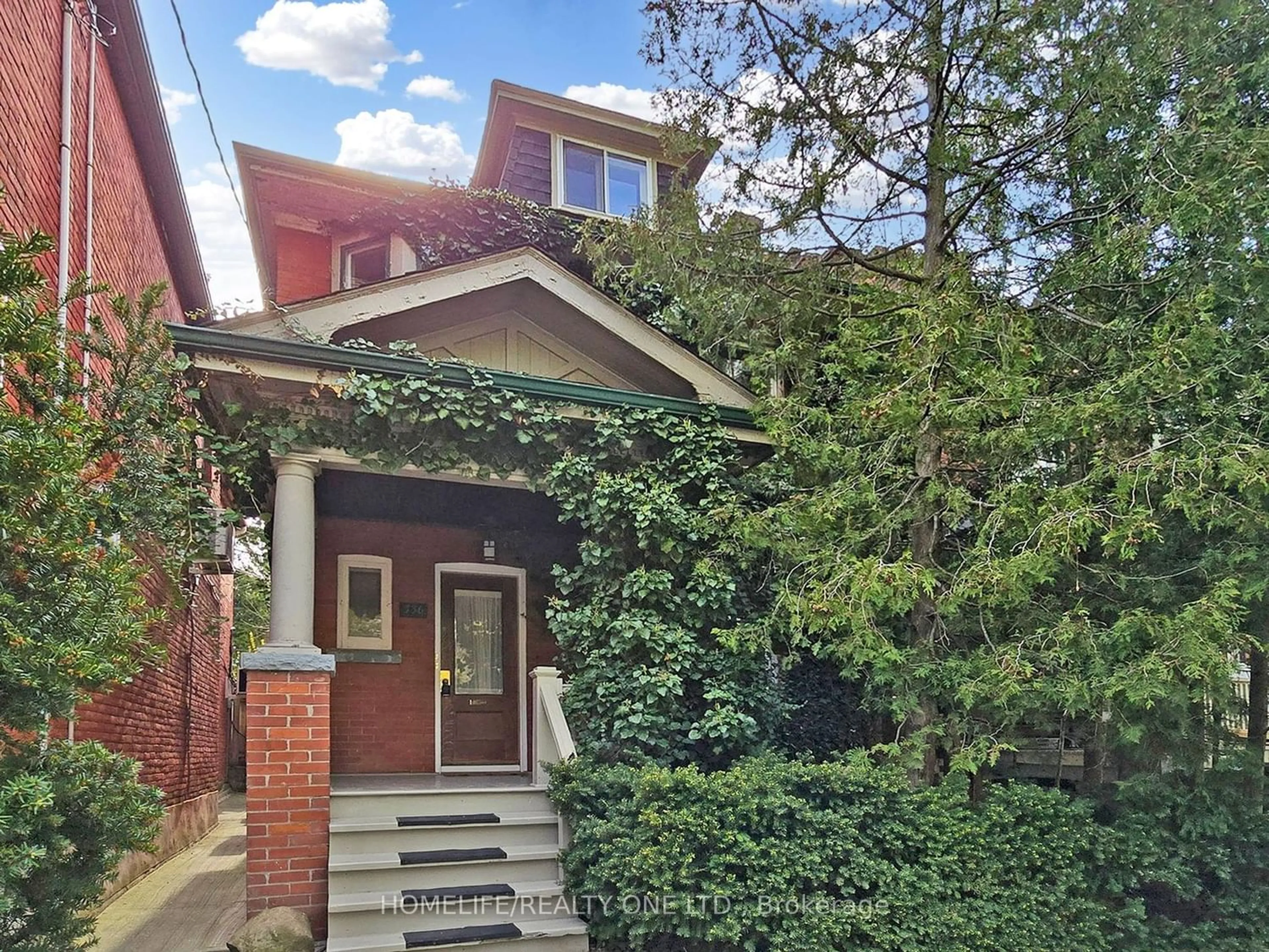 Frontside or backside of a home for 336 Rusholme Rd, Toronto Ontario M6H 2Z5